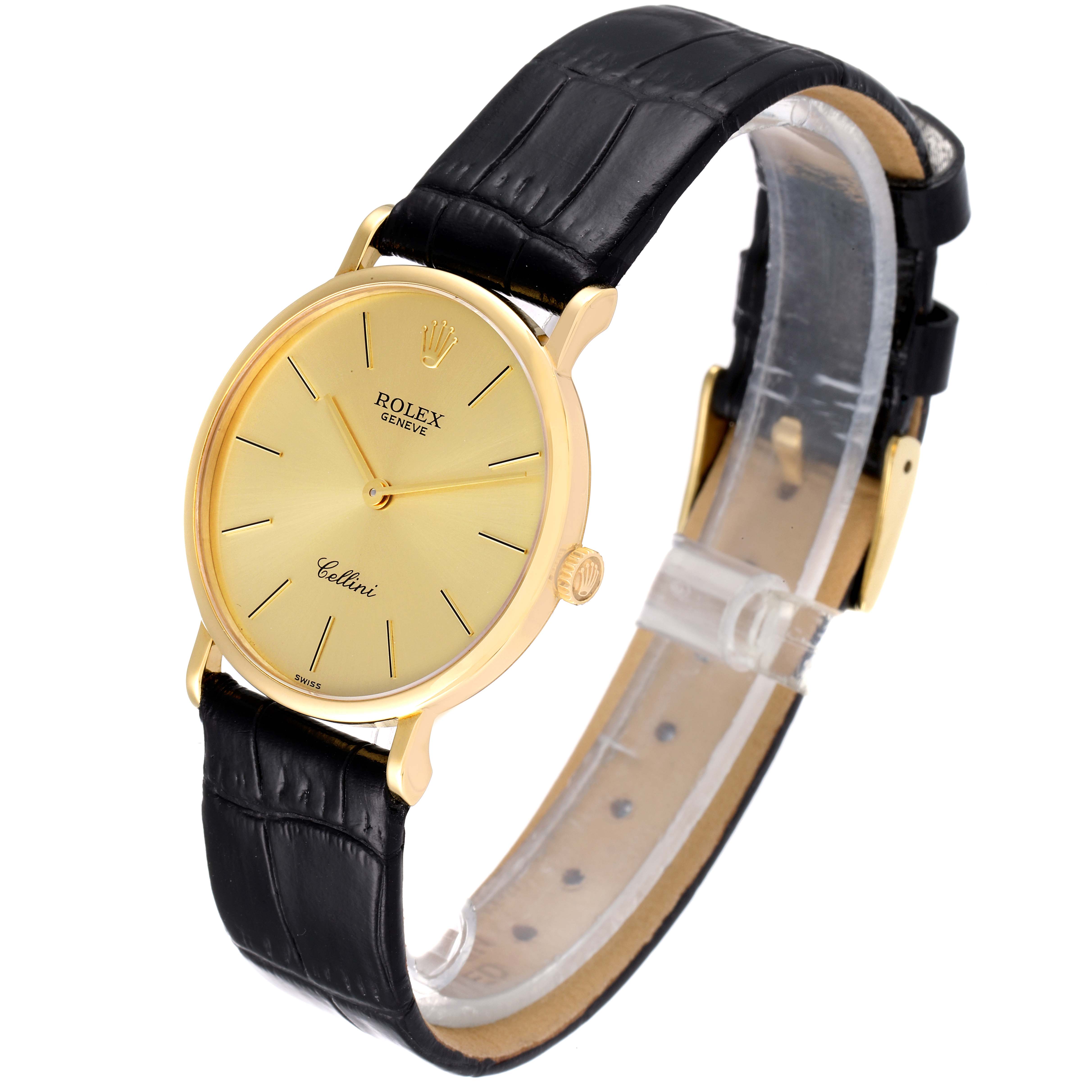 The image shows a Rolex Cellini 5112 Men's Yellow Gold Champagne Dial 5112 Men's Yellow Gold Champagne Dial watch at a slight front-side angle, highlighting its gold case, dial, and black leather strap.