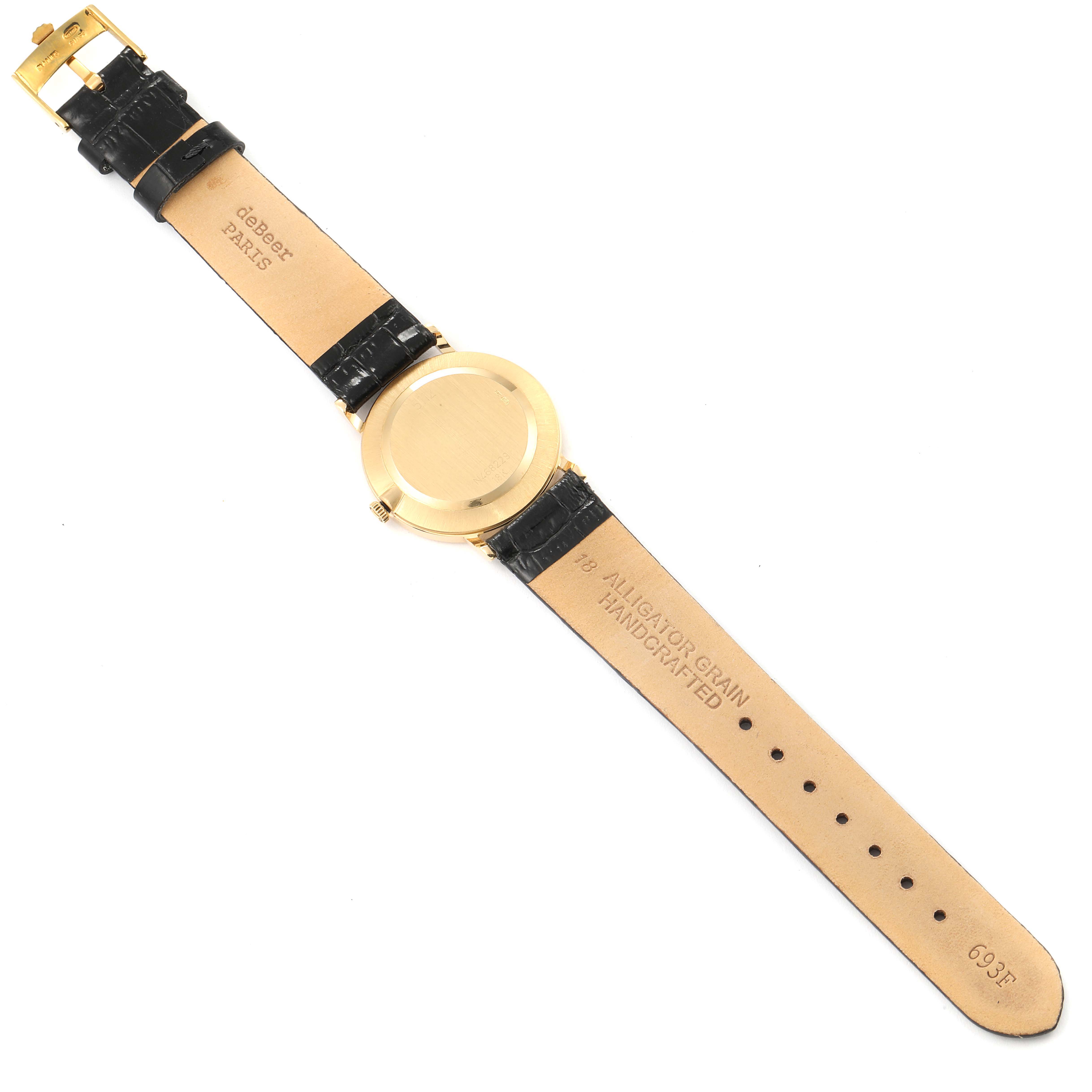 The image shows the back of a Rolex Cellini 5112 Men's Yellow Gold Champagne Dial 5112 Men's Yellow Gold Champagne Dial watch laid flat, displaying its leather straps and buckle.