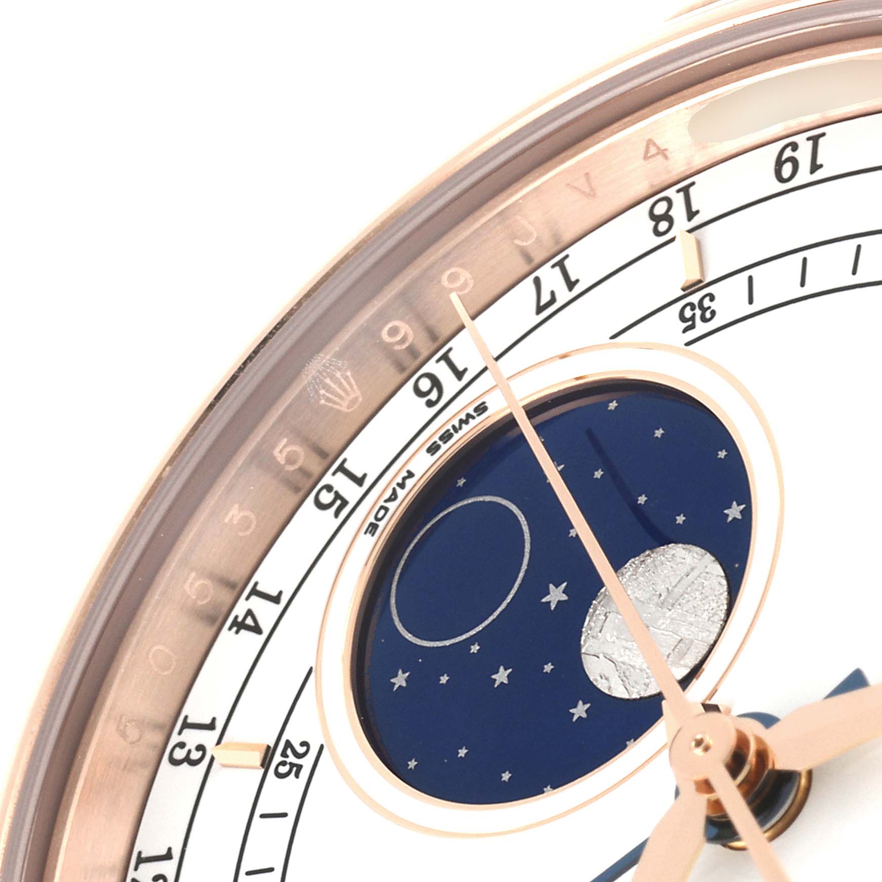 This close-up angle of the Rolex Cellini 50535 Men's Rose Gold White Dial 50535 Men's Rose Gold White Dial model shows the moonphase indicator and part of the hour markings.