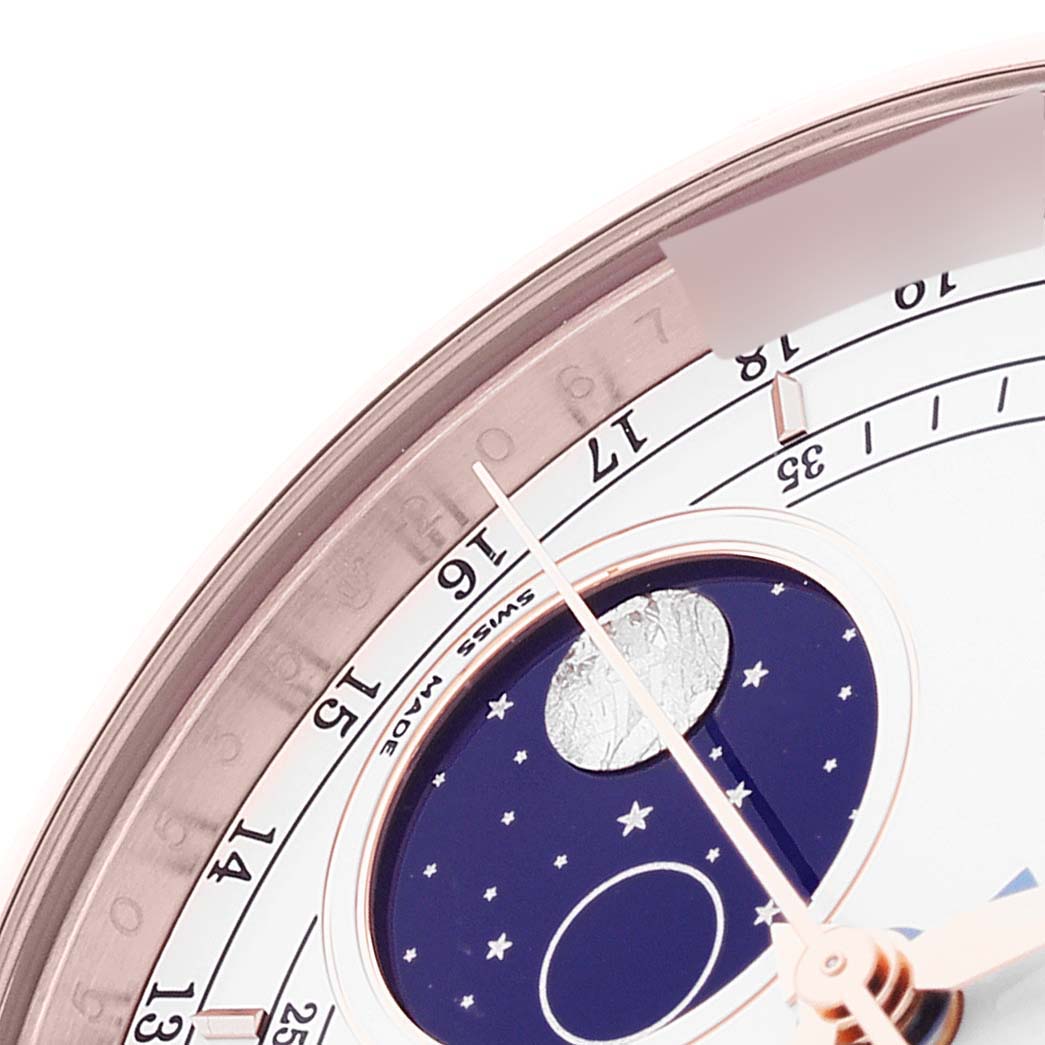 This close-up angle of the Rolex Cellini 50535 Men's Rose Gold White Dial 50535 Men's Rose Gold White Dial model displays the moon phase dial and part of the minute track.