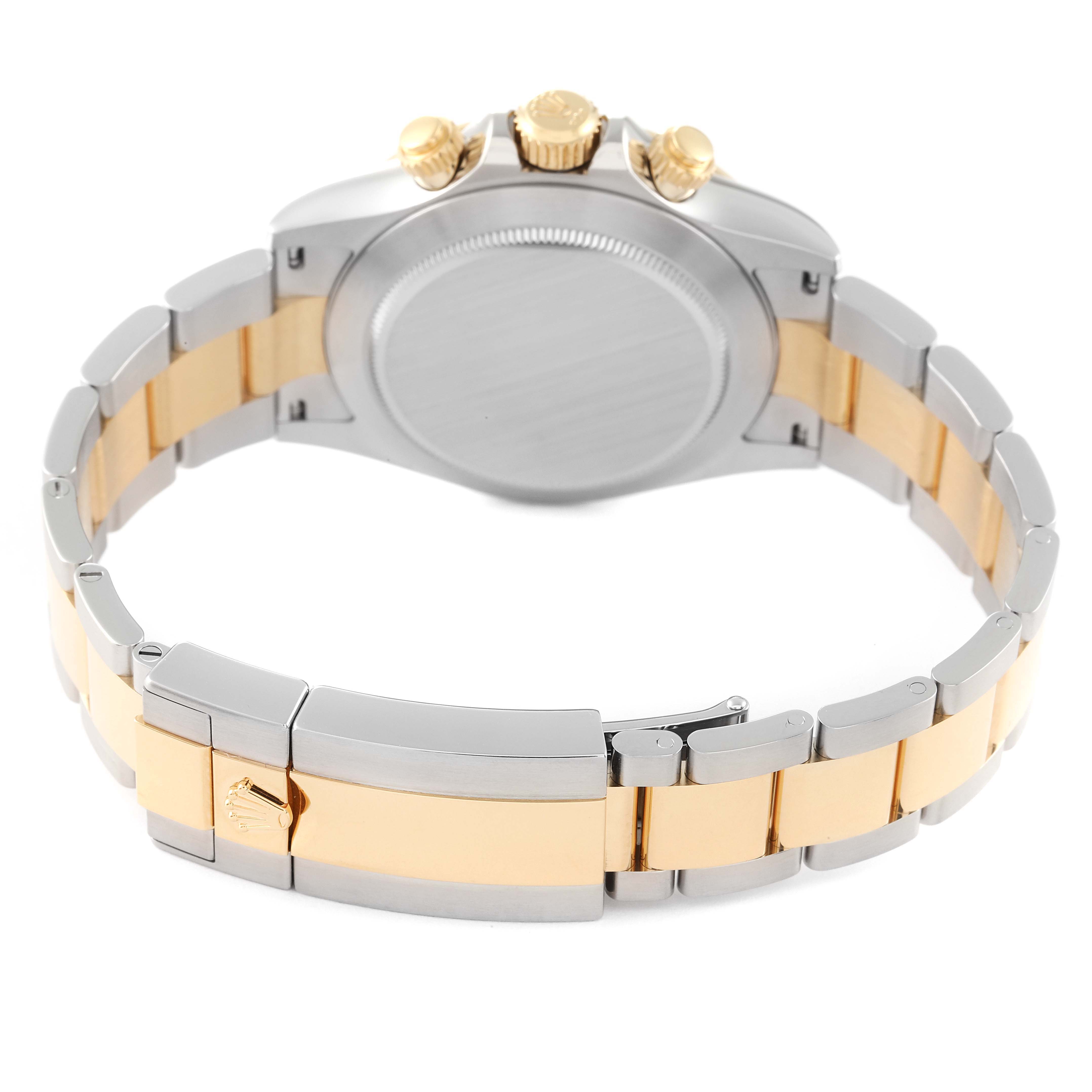 This image shows the back of a Rolex Daytona 116503 Men
s Steel and Gold (two tone) Black Dial 116503 Men
s Steel and Gold (two tone) Black Dial watch, highlighting its case back, bracelet, and clasp.