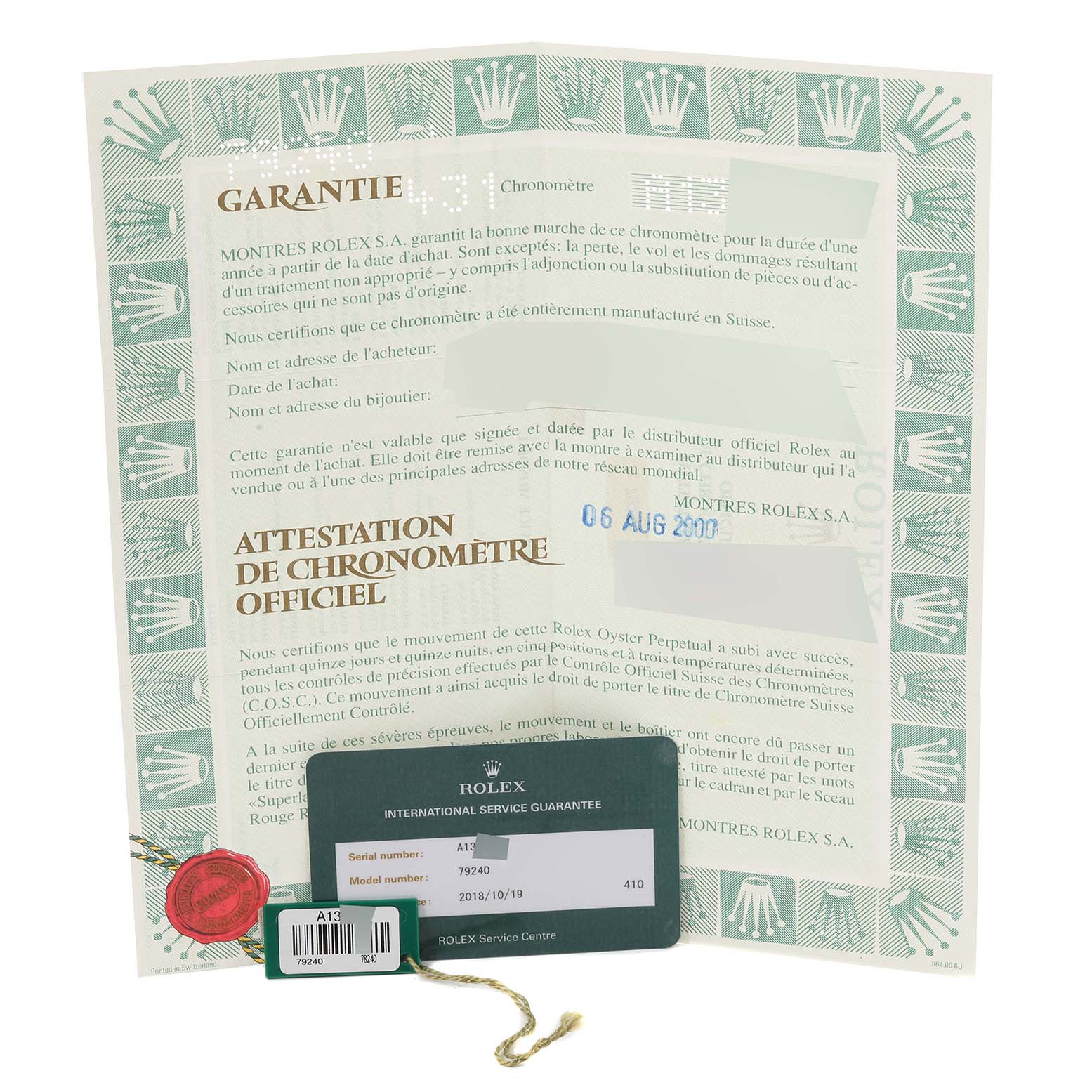 The image shows the warranty card and official chronometer certification for a Rolex Date 79240 Women's Stainless Steel Black Dial 79240 Women's Stainless Steel Black Dial model watch.