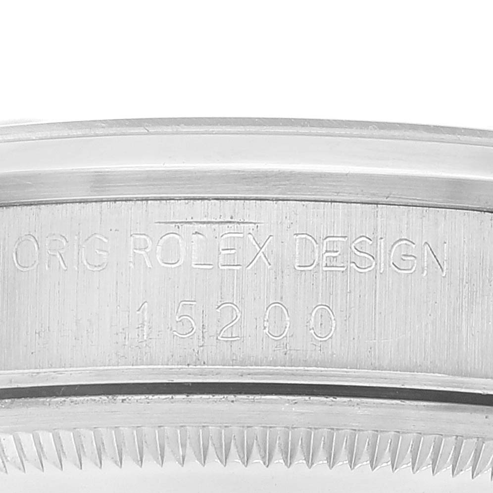 This close-up image shows the engraved side of the bezel of a Rolex Date 15200 Men
s Stainless Steel Silver Dial 15200 Men
s Stainless Steel Silver Dial model watch.