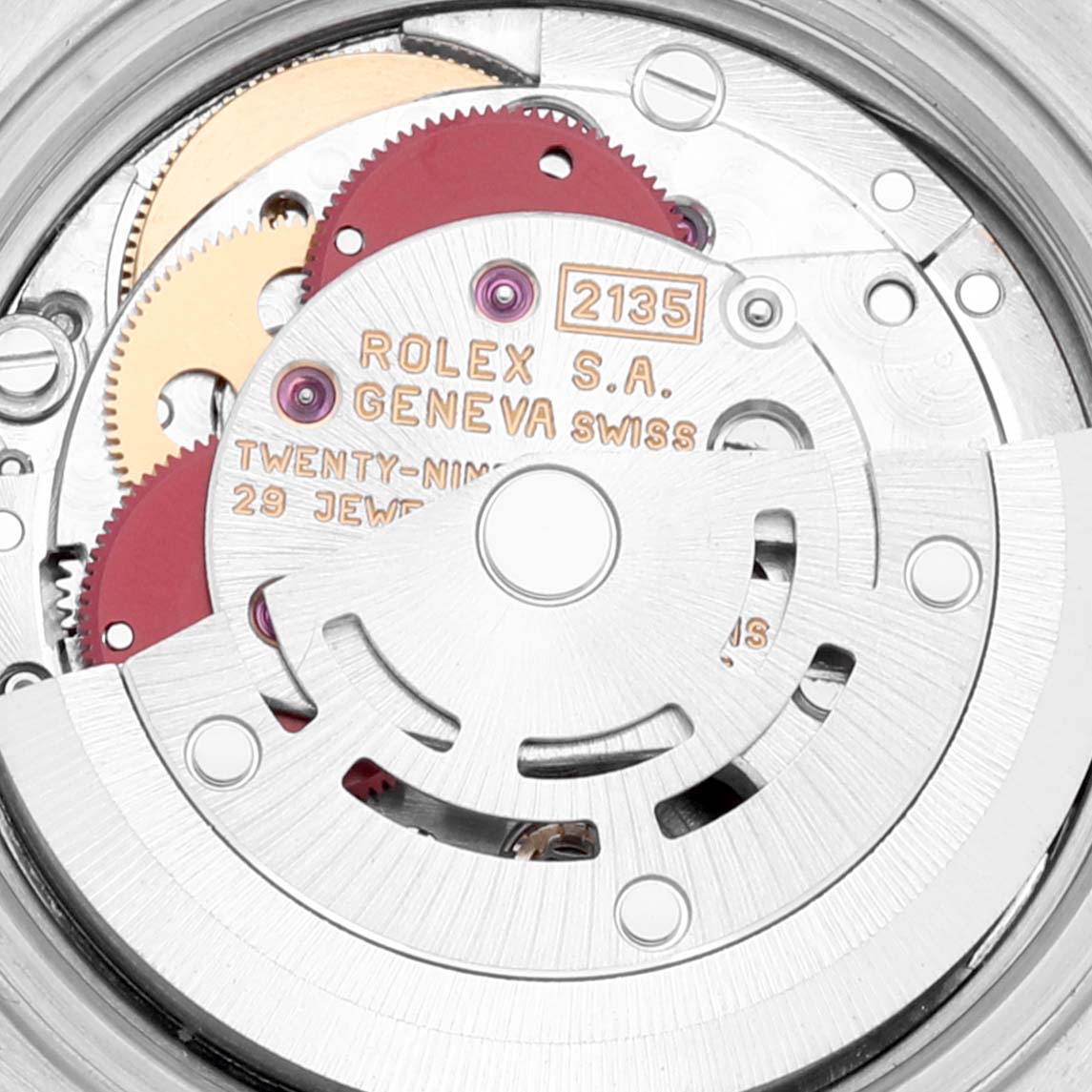 This image shows the intricate internal mechanism of a Rolex Datejust 69173 Women's Steel and Gold (two tone) Champagne Dial 69173 Women's Steel and Gold (two tone) Champagne Dial watch, highlighting its gears and movement components.