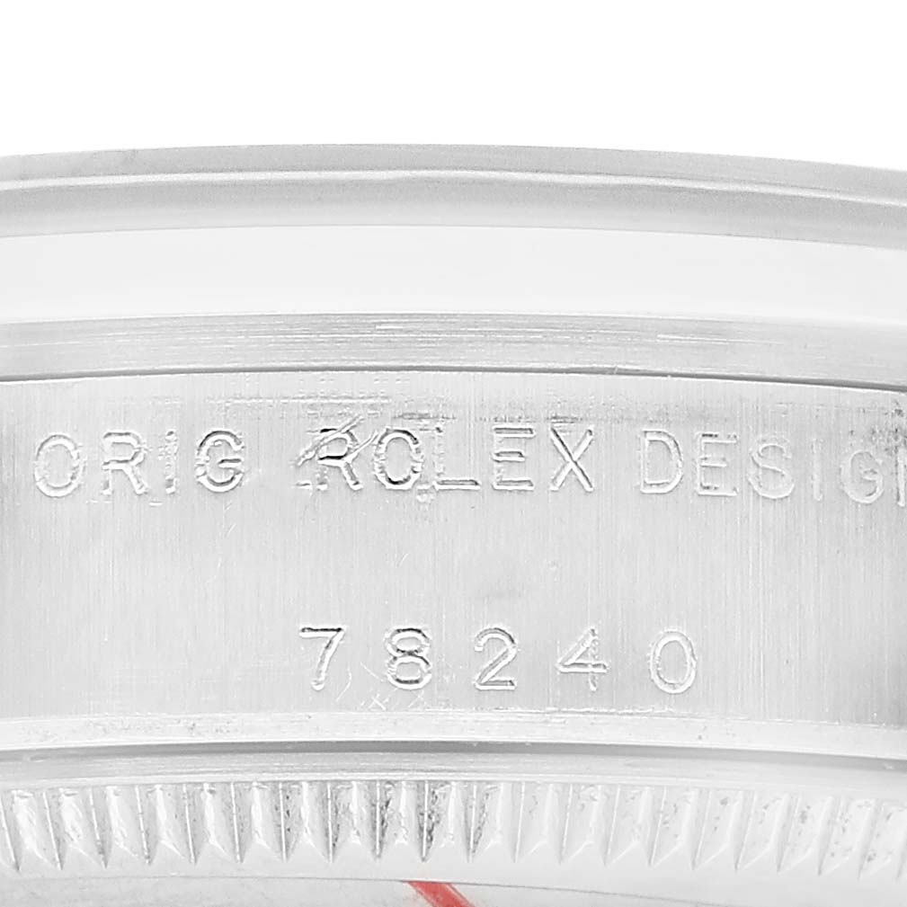The image shows a close-up of the side of a Rolex Mid-Size 78240 Women's Stainless Steel Silver Dial watch, featuring the model number 78240 engraved.