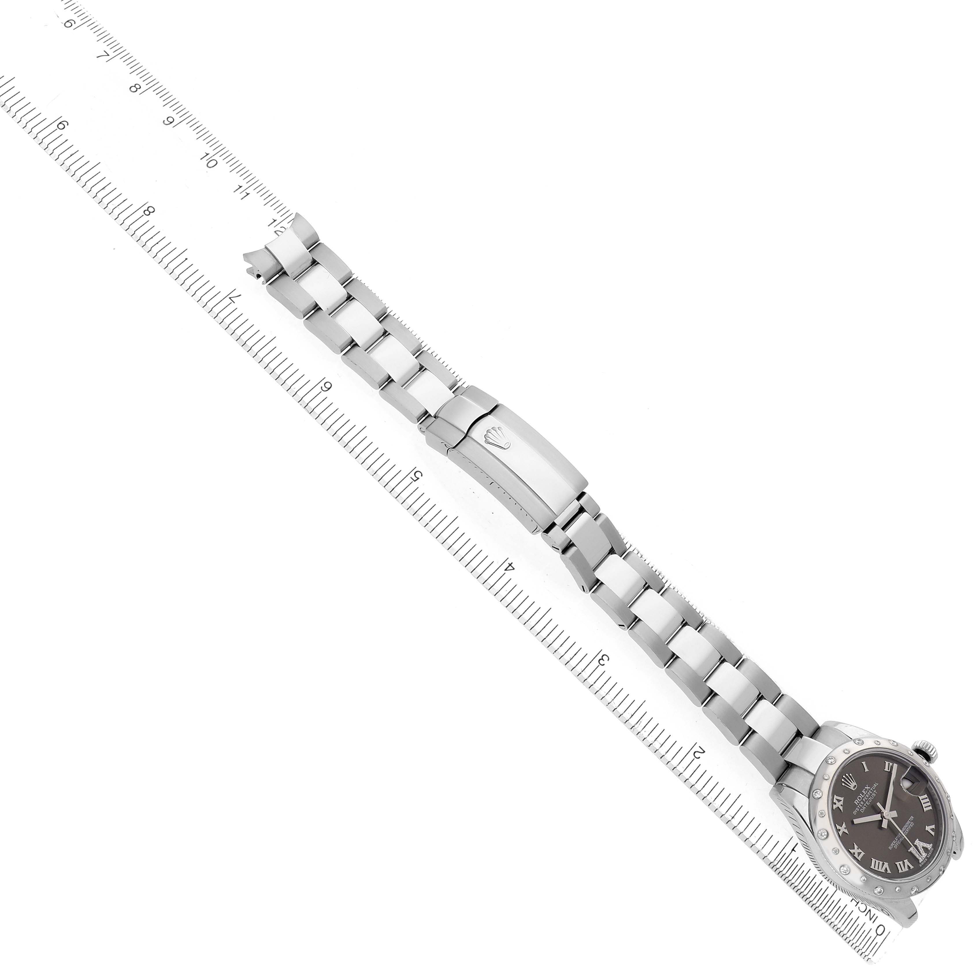 The Rolex Datejust 178344 Women
s Stainless Steel Grey Dial watch is shown from a top-down perspective, highlighting the bracelet, clasp, and face.