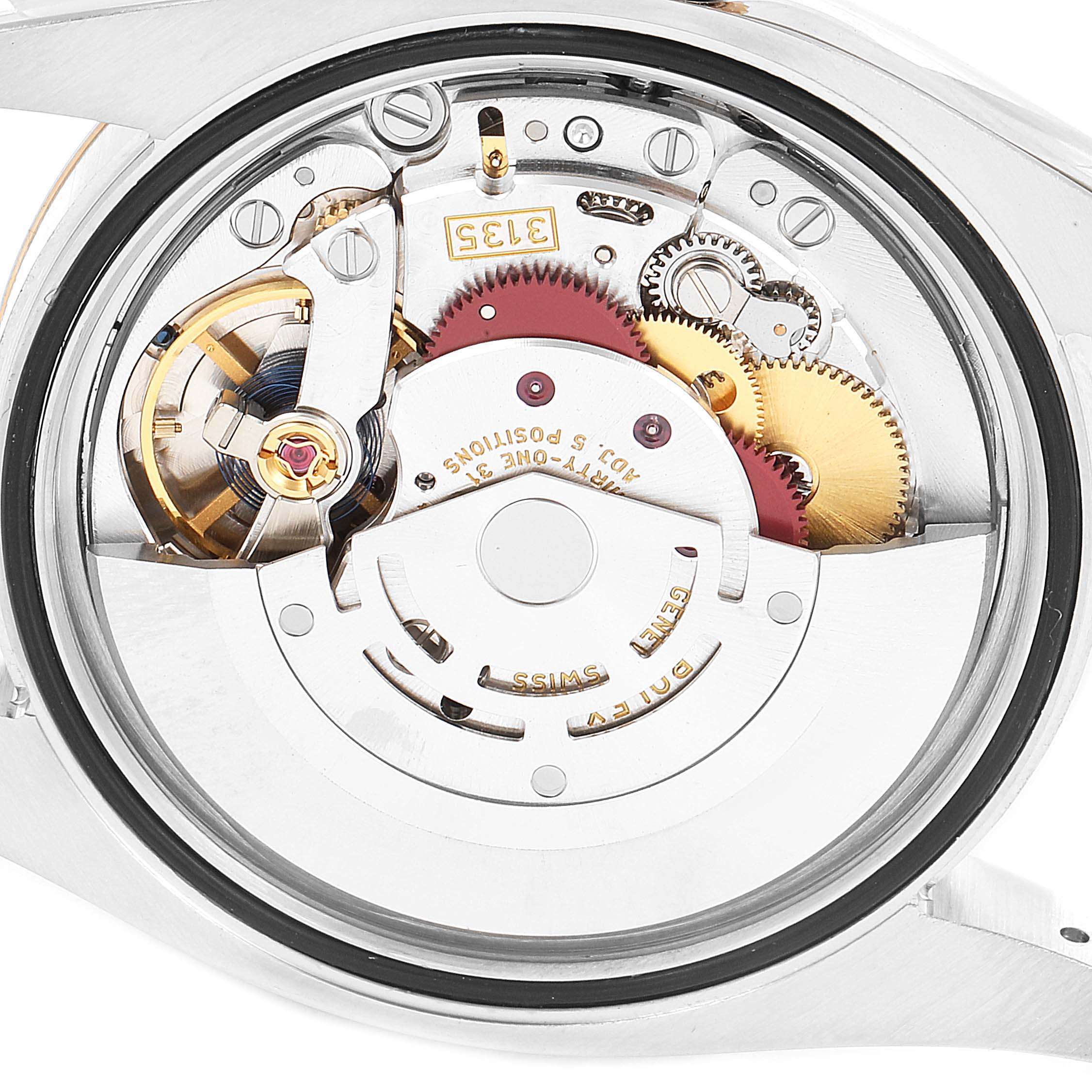 This close-up image shows the internal movement mechanism of the Rolex Datejust 116231 Men's Steel and Gold (two tone) Pink Dial 116231 Men's Steel and Gold (two tone) Pink Dial watch, highlighting its gears and components.