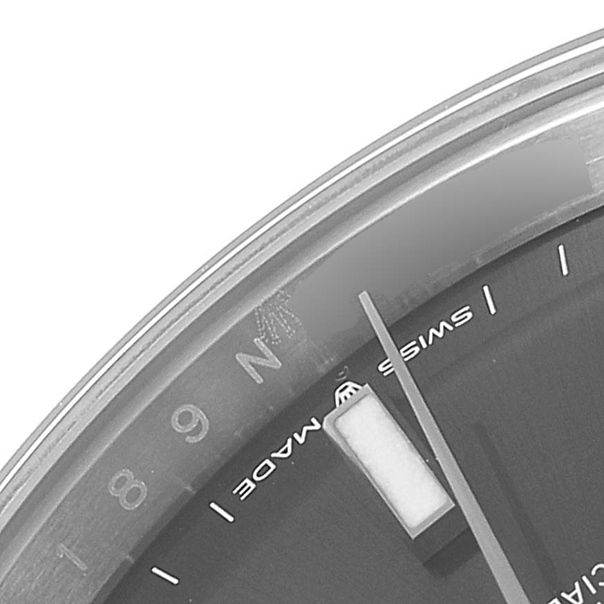 This close-up image shows a partial view of the dial and hour markers of a Rolex Datejust 41 126300 Men's Stainless Steel Grey Dial 126300 Men's Stainless Steel Grey Dial watch.