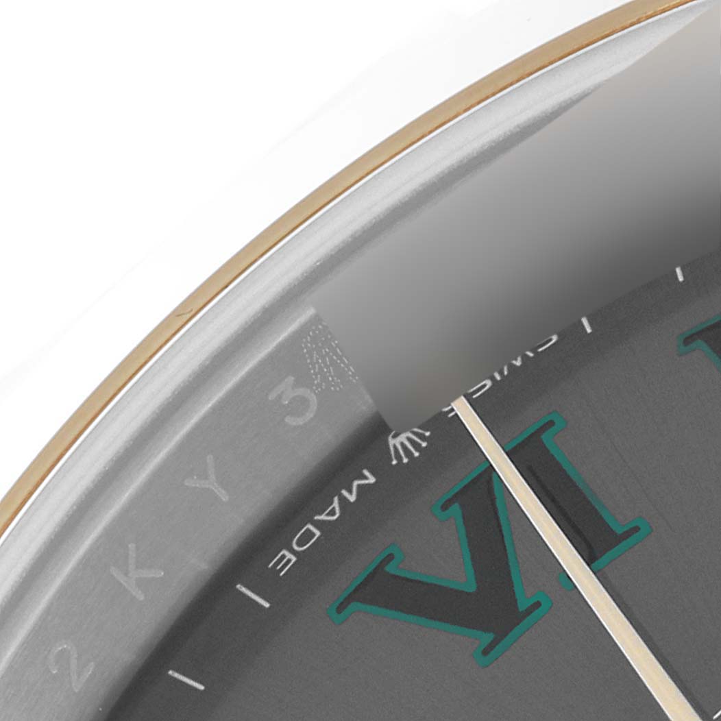This close-up shows the outer edge of the dial and part of the minute hand of the Rolex Datejust 41 126303 Men
s Steel and Gold (two tone) Grey Dial 126303 Men
s Steel and Gold (two tone) Grey Dial watch.