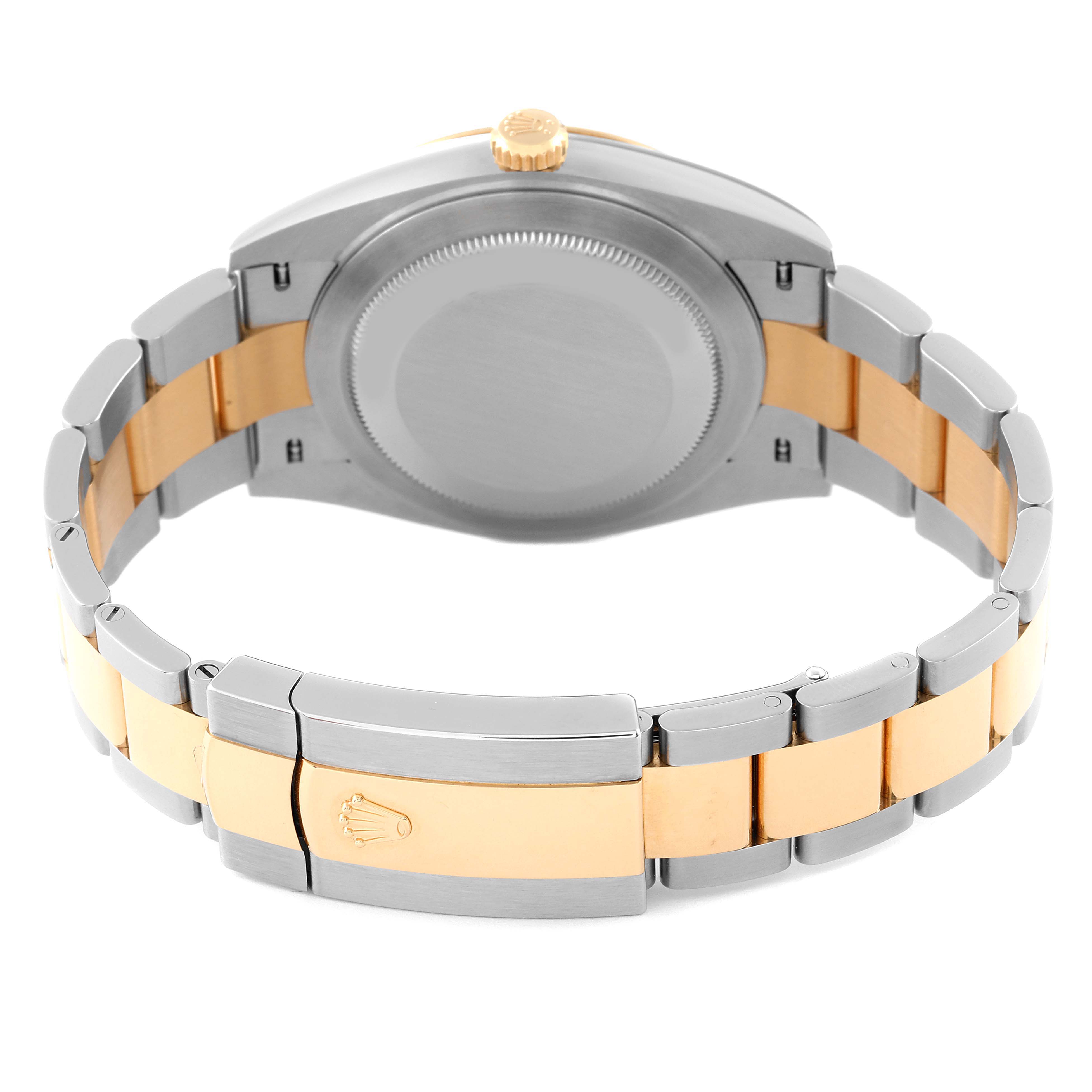 The image shows the back view of the case and clasp of a Rolex Datejust 41 126303 Men
s Steel and Gold (two tone) Grey Dial 126303 Men
s Steel and Gold (two tone) Grey Dial watch, highlighting its two-tone metal bracelet.
