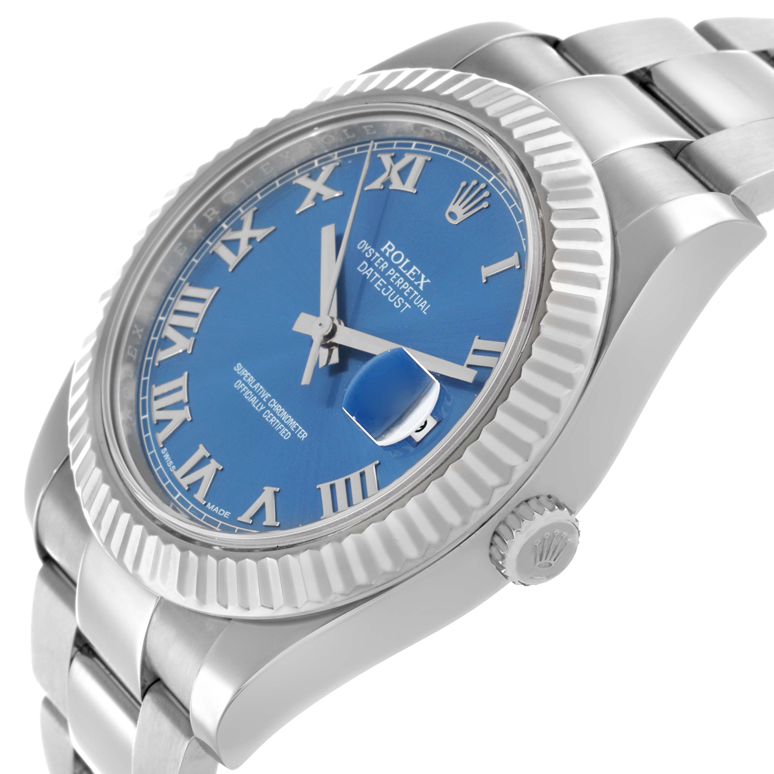 The Rolex Datejust 41 116334 Men
s Stainless Steel Blue Dial is shown at an angle highlighting the dial, bezel, crown, and part of the bracelet.
