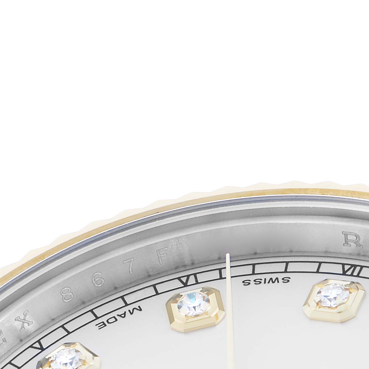 The image shows a close-up of the Rolex Datejust 41 116333 Men
s Steel and Gold (two tone) Silver Dial dial with diamond hour markers and part of the fluted bezel.