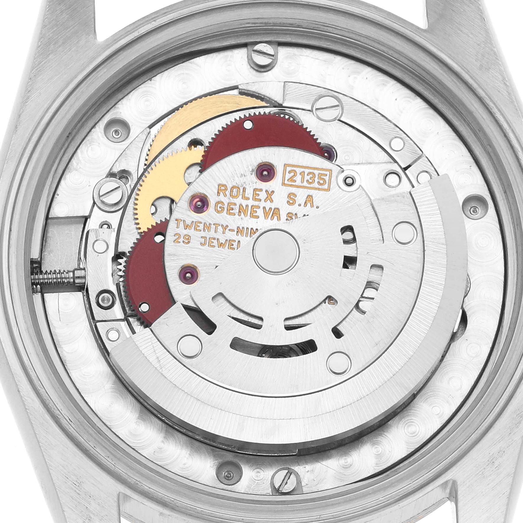 The image shows the back view of a Rolex Datejust 68243 Women
s Steel and Gold (two tone) White Dial, highlighting its movement mechanism and internal components.