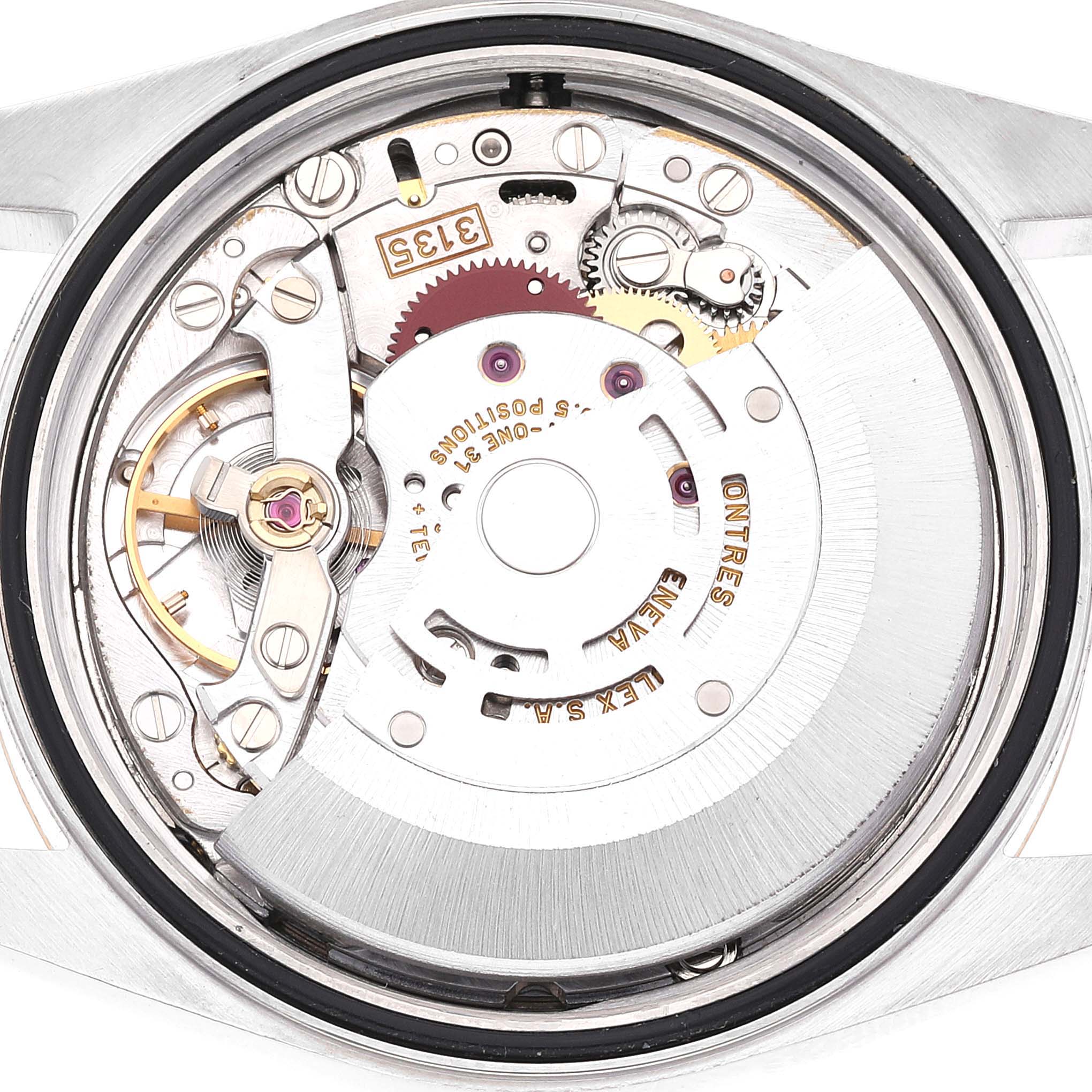 The image shows the inner mechanics and movement components of a Rolex Datejust 16233 Men's Steel and Gold (two tone) Silver Dial 16233 Men's Steel and Gold (two tone) Silver Dial watch from a directly overhead angle.