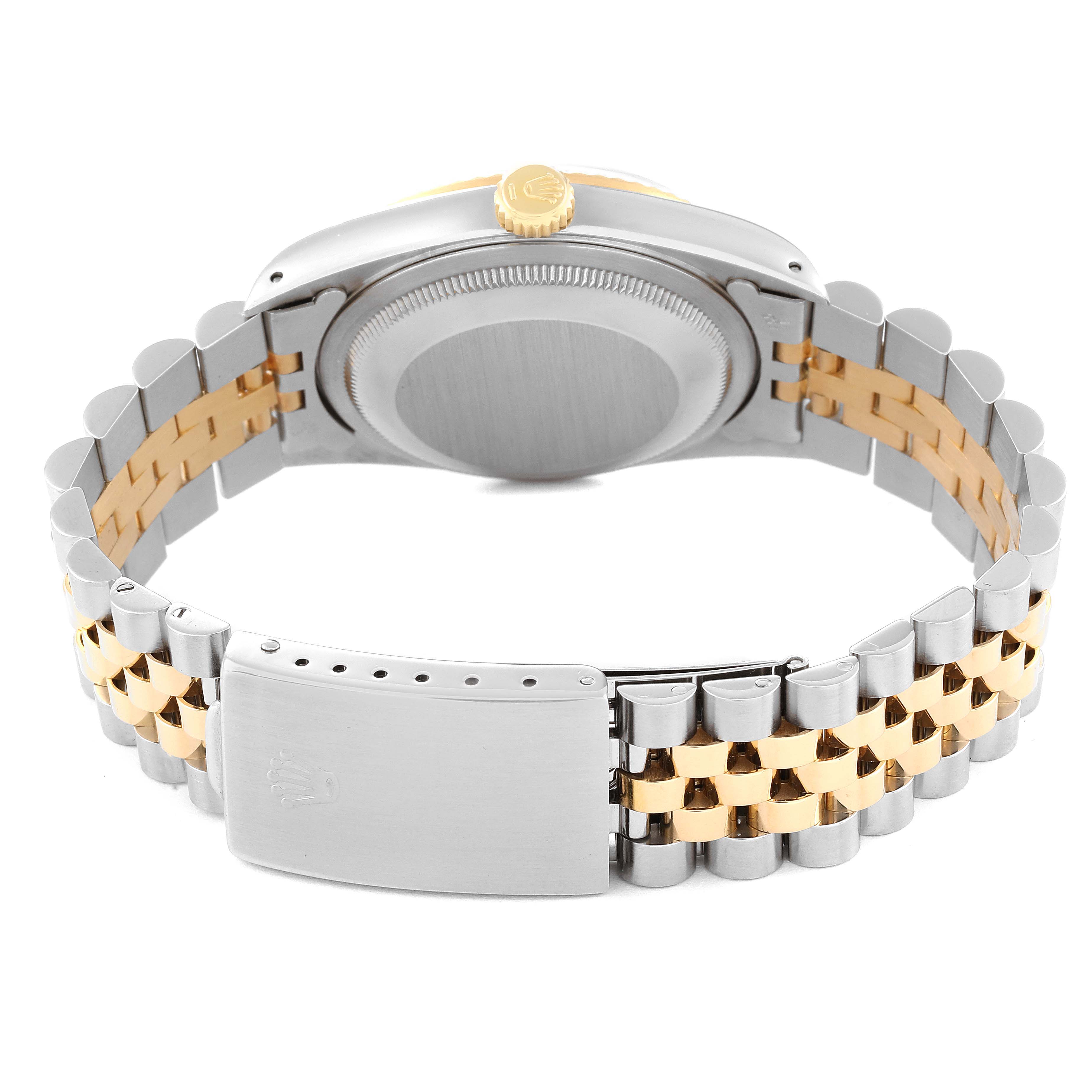 This image shows the back view of a Rolex Datejust 16233 Men's Steel and Gold (two tone) White Dial 16233 Men's Steel and Gold (two tone) White Dial watch, focusing on the clasp, case back, and two-tone bracelet.