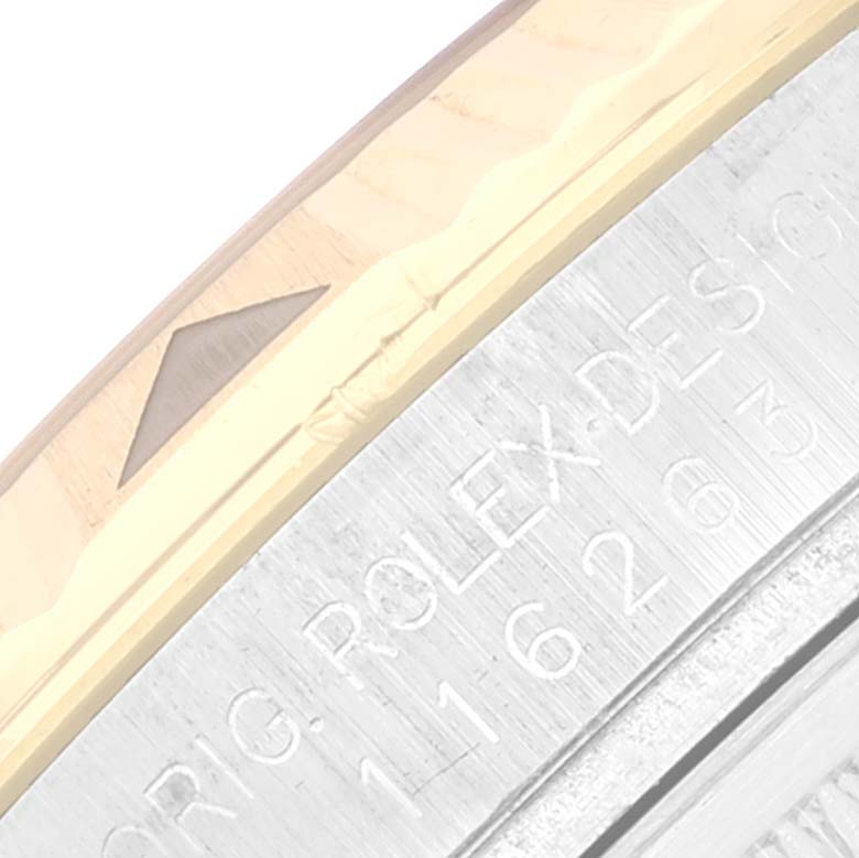 The image shows a close-up of the Turn-o-Graph Rolex watch bezel and case edge, highlighting the engraved design number.