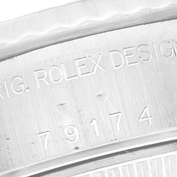 This image shows a close-up of the inner rim and serial number of a Rolex Datejust 79174 Women's Stainless Steel Pink Dial 79174 Women's Stainless Steel Pink Dial watch.