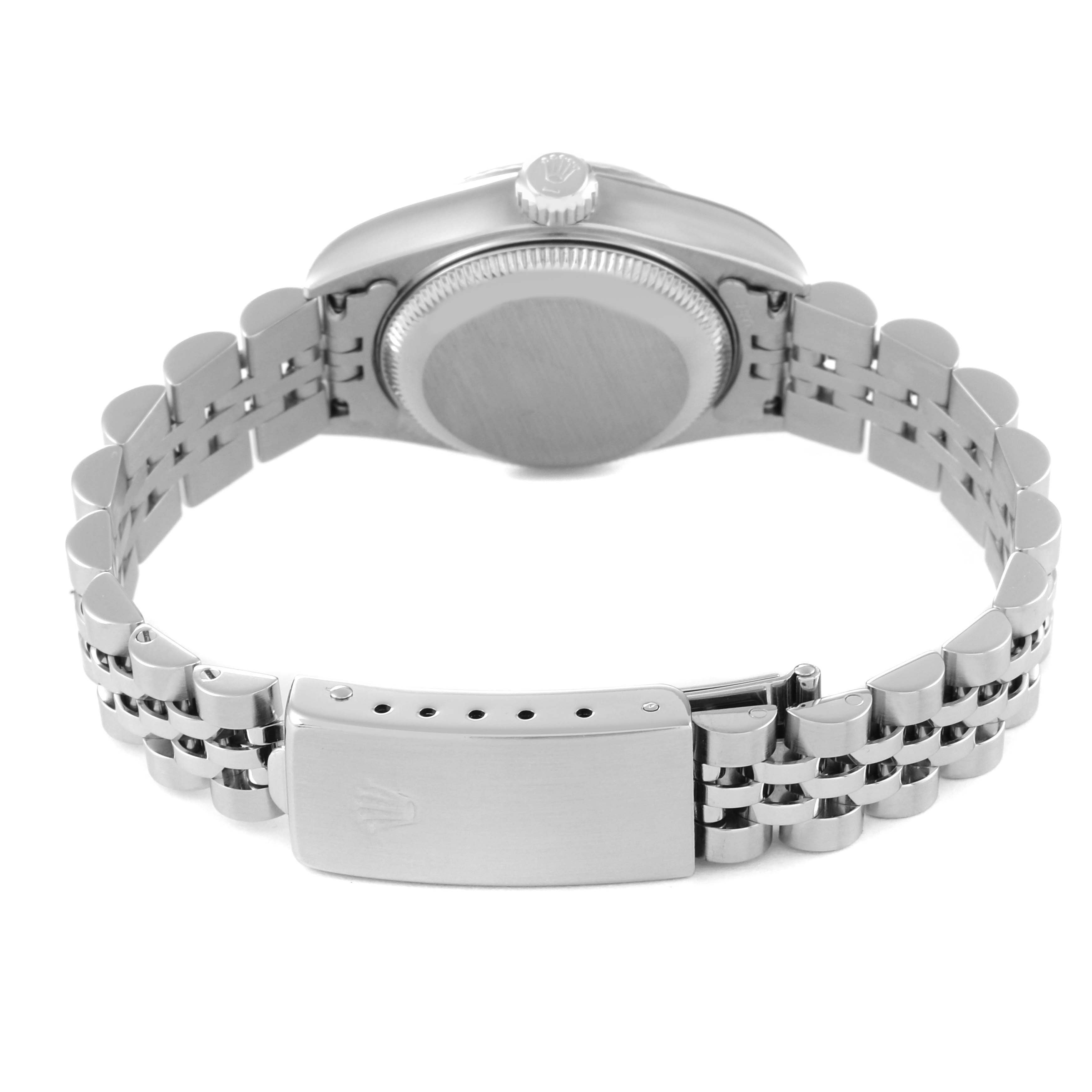 This image shows the back view of the Rolex Datejust 79174 Women's Stainless Steel Pink Dial 79174 Women's Stainless Steel Pink Dial watch, displaying the case back, crown, and bracelet with clasp.