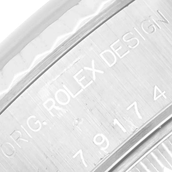 This image shows a close-up of the inner bezel with engraving details of the Rolex Datejust 79174 Women's Stainless Steel Pink Dial 79174 Women's Stainless Steel Pink Dial model.