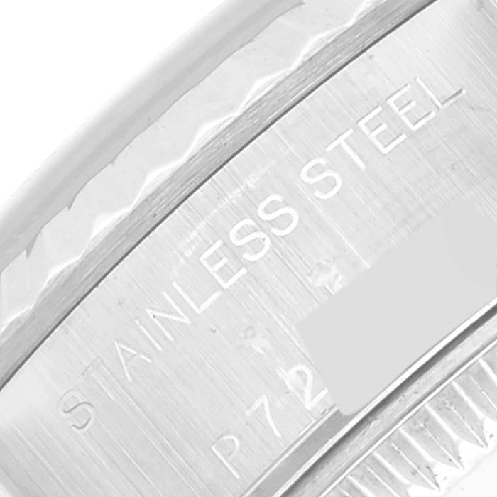 This close-up angle of the Rolex Datejust 79174 Women's Stainless Steel Pink Dial 79174 Women's Stainless Steel Pink Dial shows the "Stainless Steel" engraving on the watch casing.