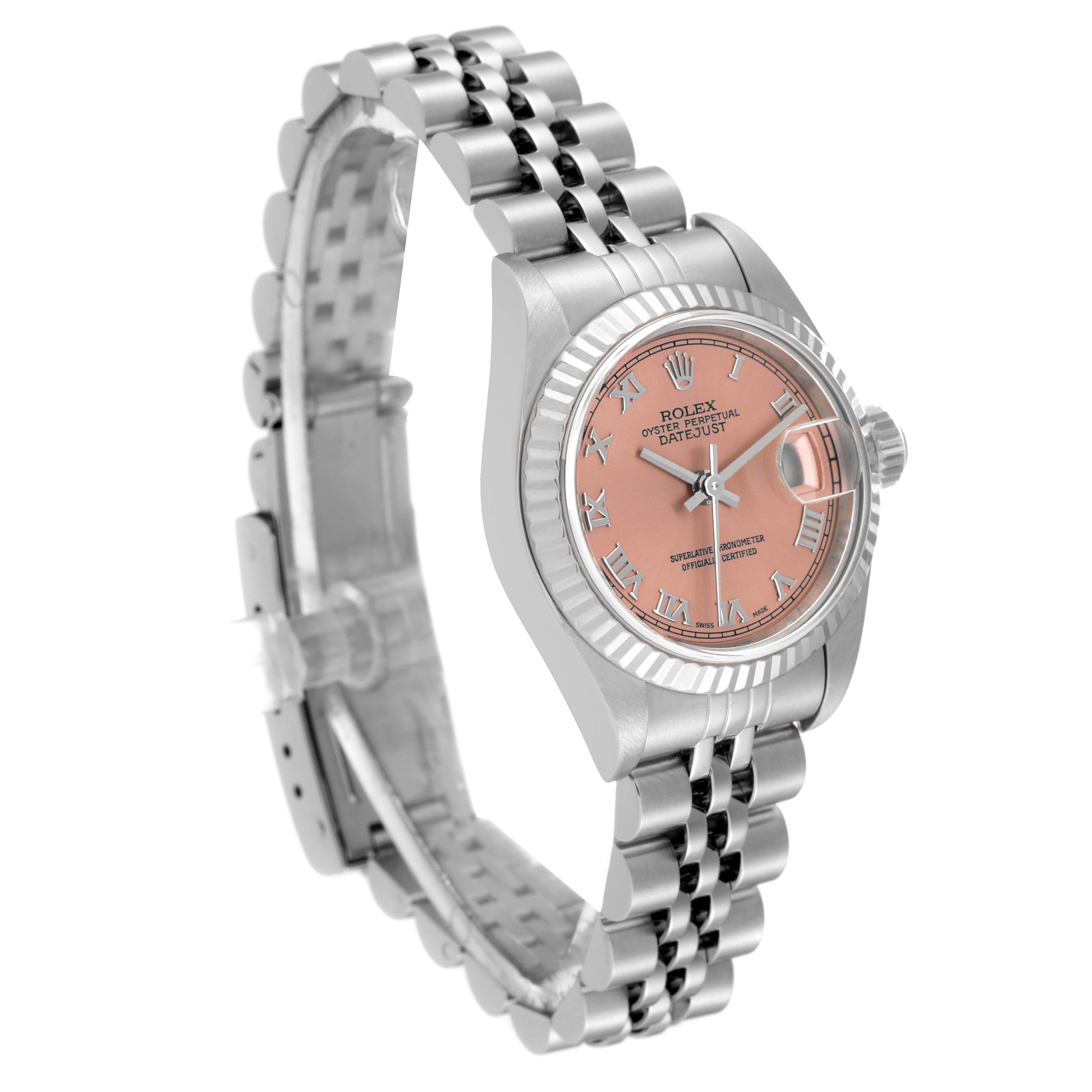 The Rolex Datejust 79174 Women's Stainless Steel Pink Dial 79174 Women's Stainless Steel Pink Dial watch is shown at a three-quarter angle, displaying the face, bezel, and bracelet.