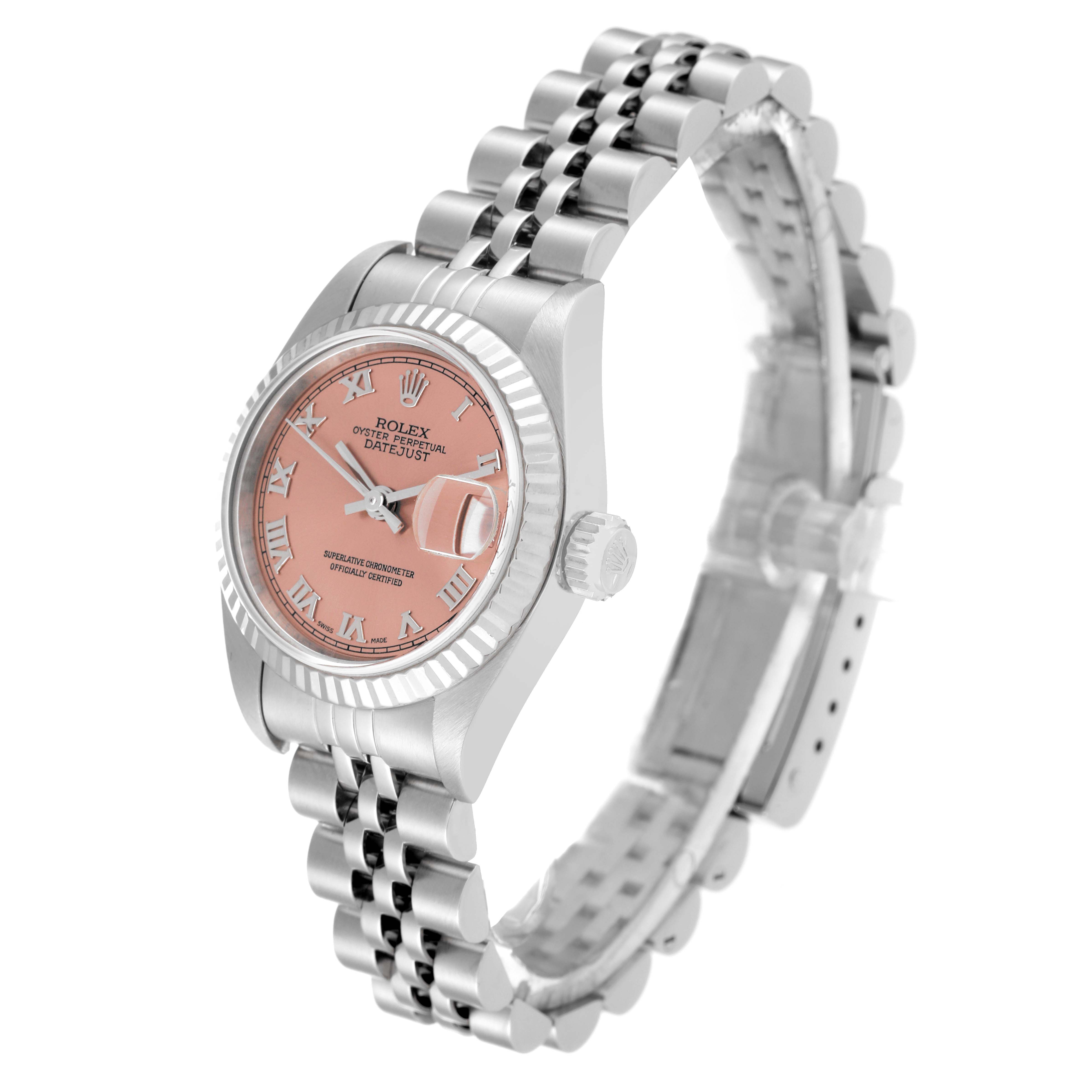 The Rolex Datejust 79174 Women's Stainless Steel Pink Dial 79174 Women's Stainless Steel Pink Dial watch is shown at a slight angle, capturing the face, bezel, crown, and partial jubilee bracelet.