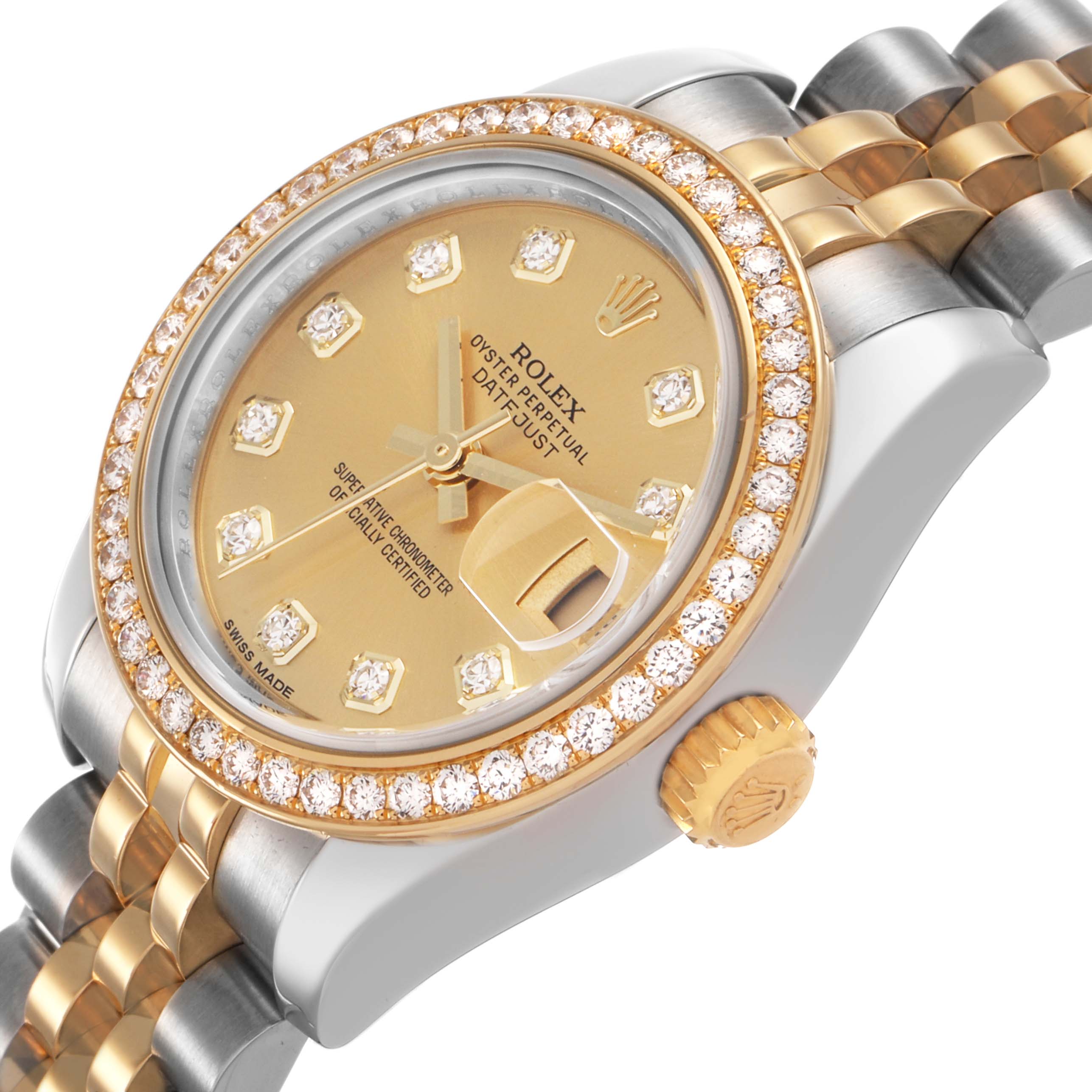 The Rolex Datejust 179383 Women's Steel and Gold (two tone) Champagne Dial watch is shown at a slight angle, featuring a diamond bezel, gold dial with diamond markers, and a two-tone bracelet.