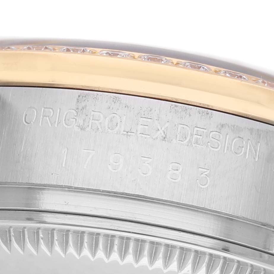 The image shows a close-up of the side of a Rolex Datejust 179383 Women's Steel and Gold (two tone) Champagne Dial, displaying the engraved model number and part of the bezel.