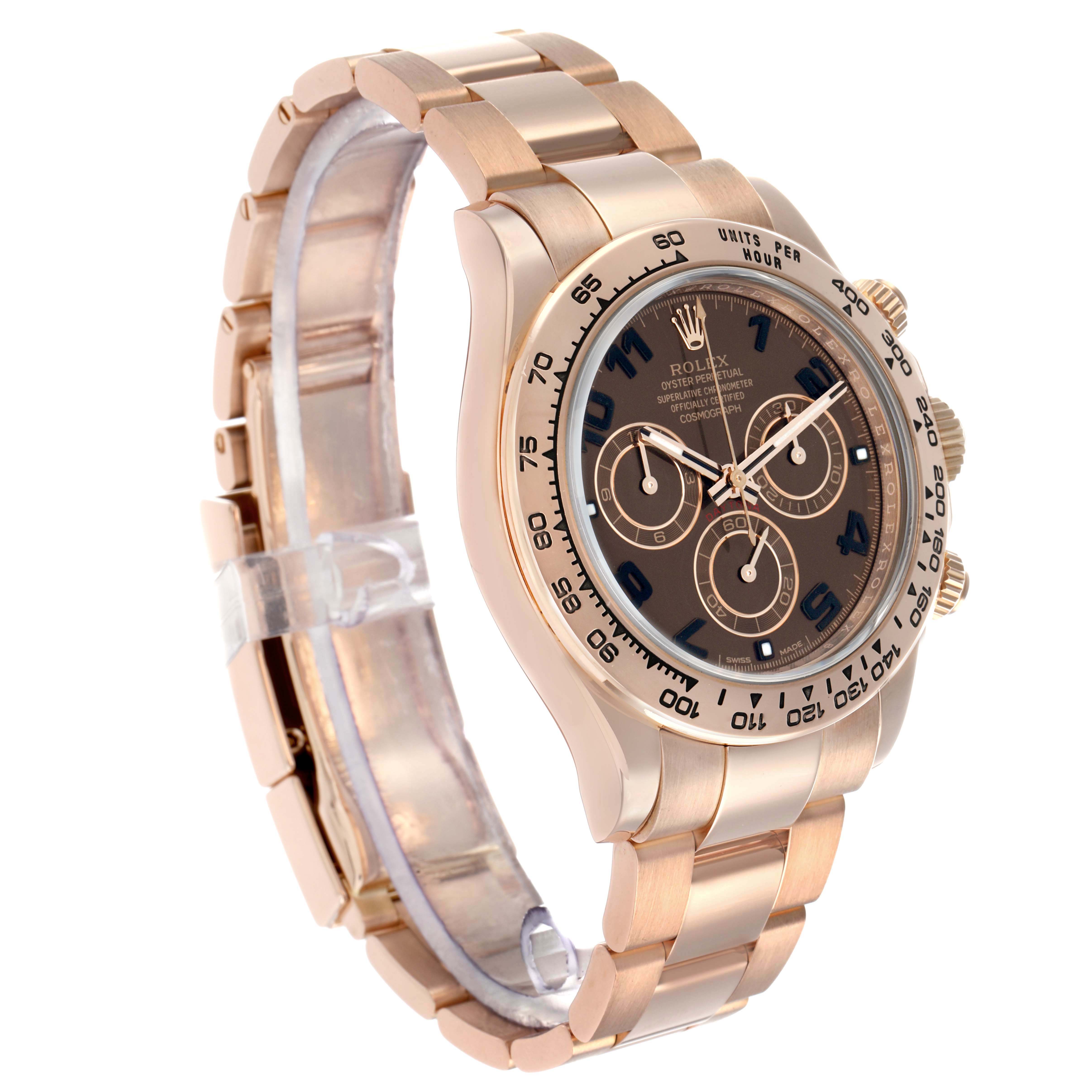 The Rolex Daytona 116505 Men
s Rose Gold Brown Dial watch is shown at a three-quarter angle, highlighting its face, bezel, crown, and bracelet.