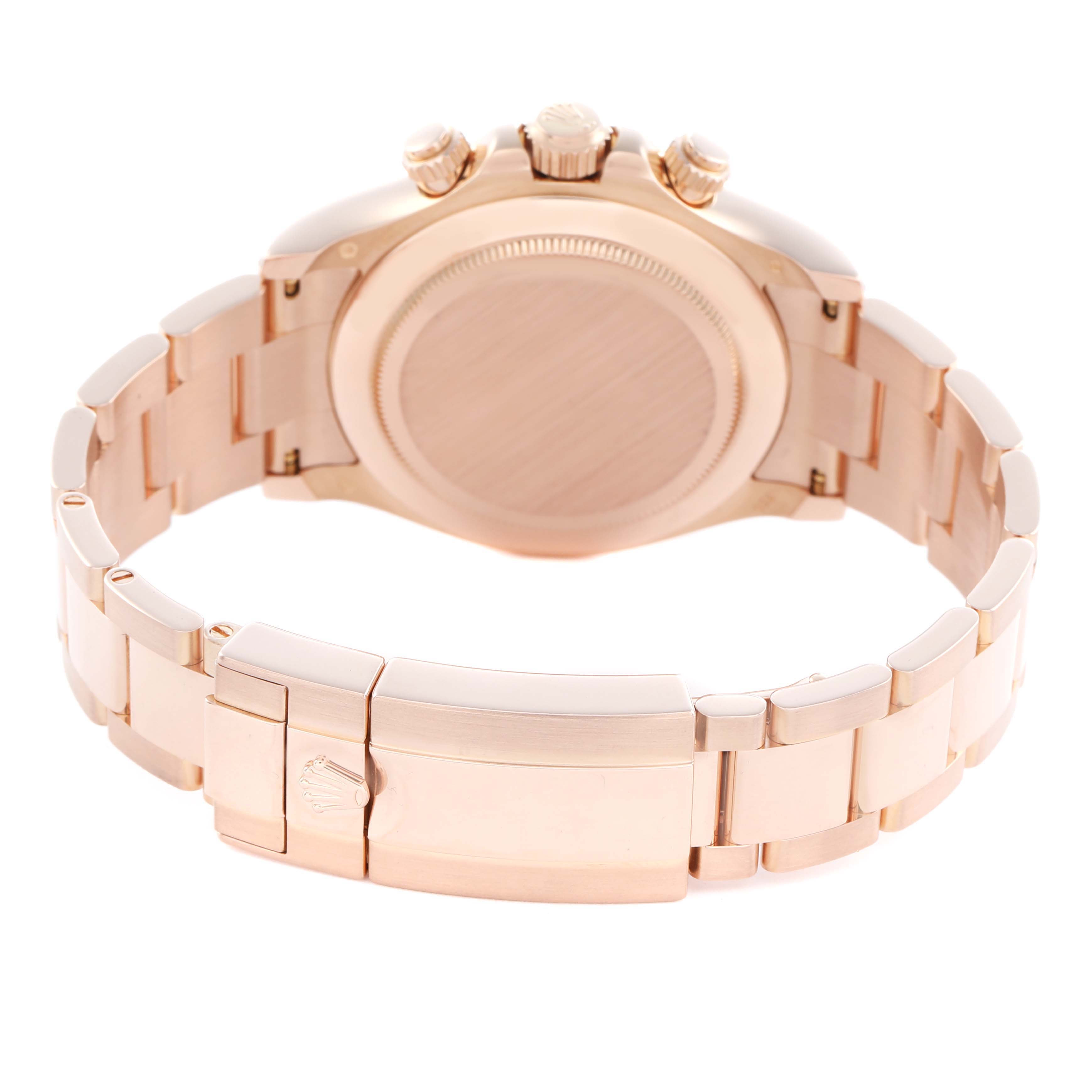 The image shows the back of a Rolex Daytona 116505 Men
s Rose Gold Brown Dial, highlighting the clasp and bracelet with the case back and crown partially visible.