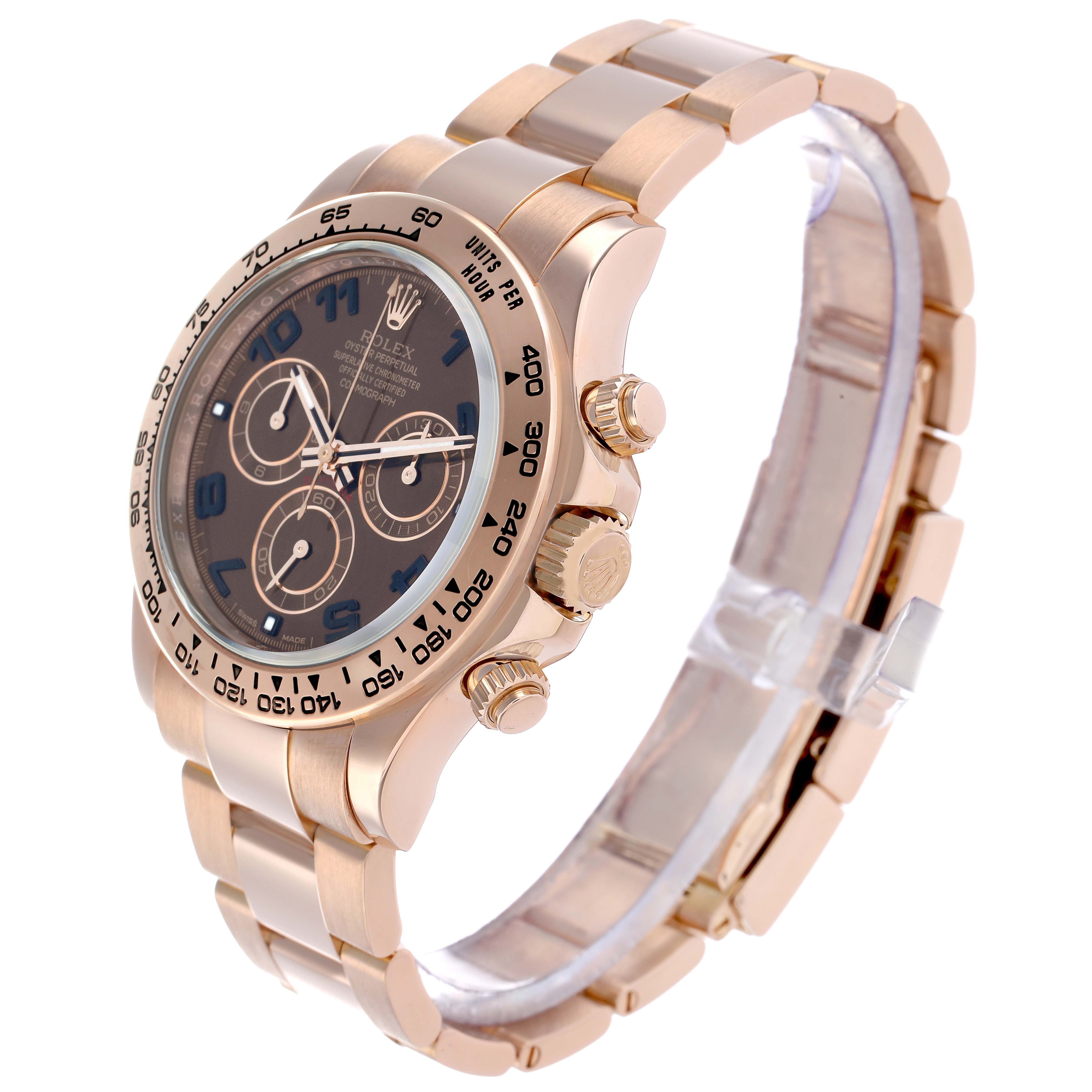 The Rolex Daytona 116505 Men
s Rose Gold Brown Dial watch is shown at a three-quarter angle, highlighting the case, bezel, dial, and bracelet.