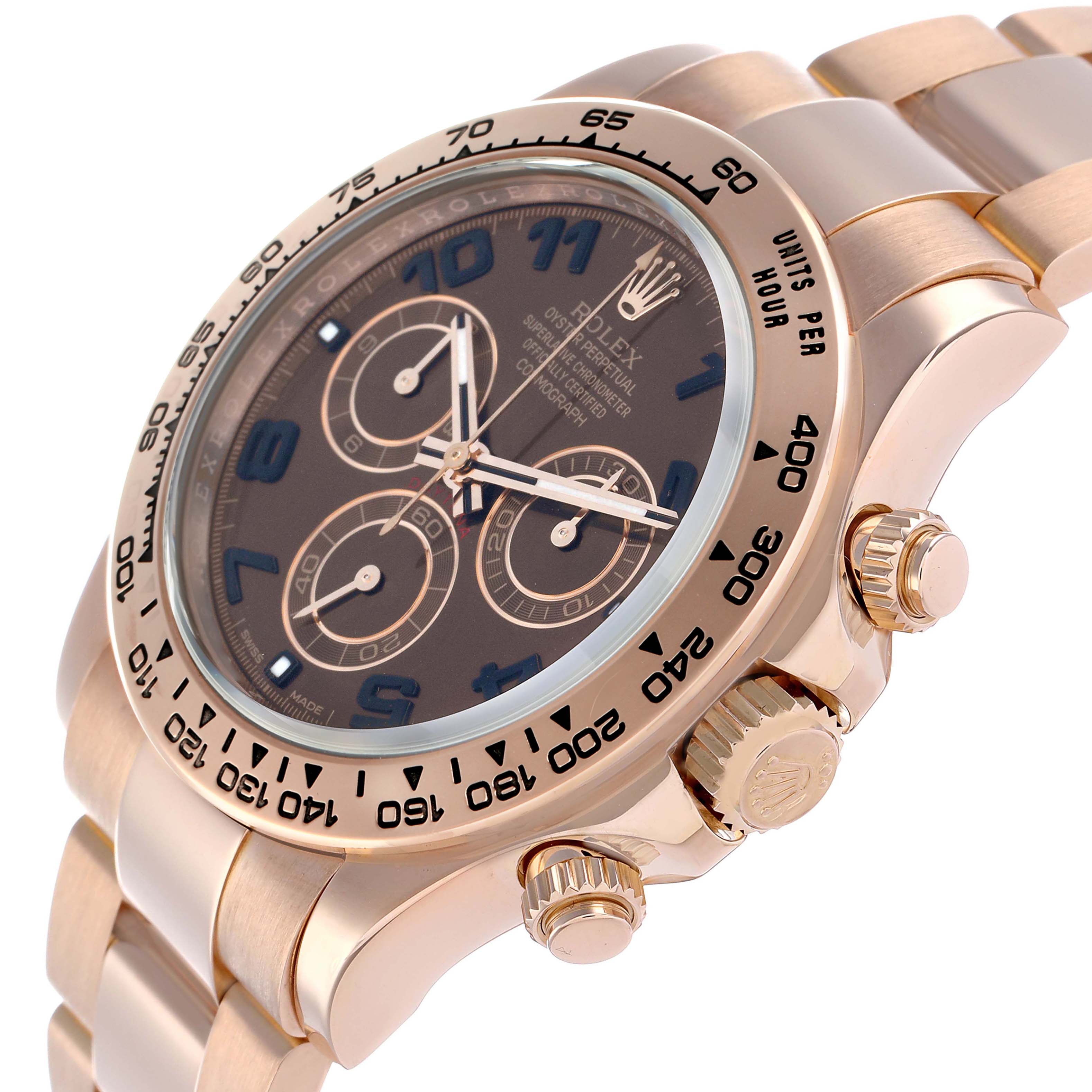 The Rolex Daytona 116505 Men
s Rose Gold Brown Dial is shown at an angled side view, highlighting the bezel, crown, pushers, and part of the bracelet.