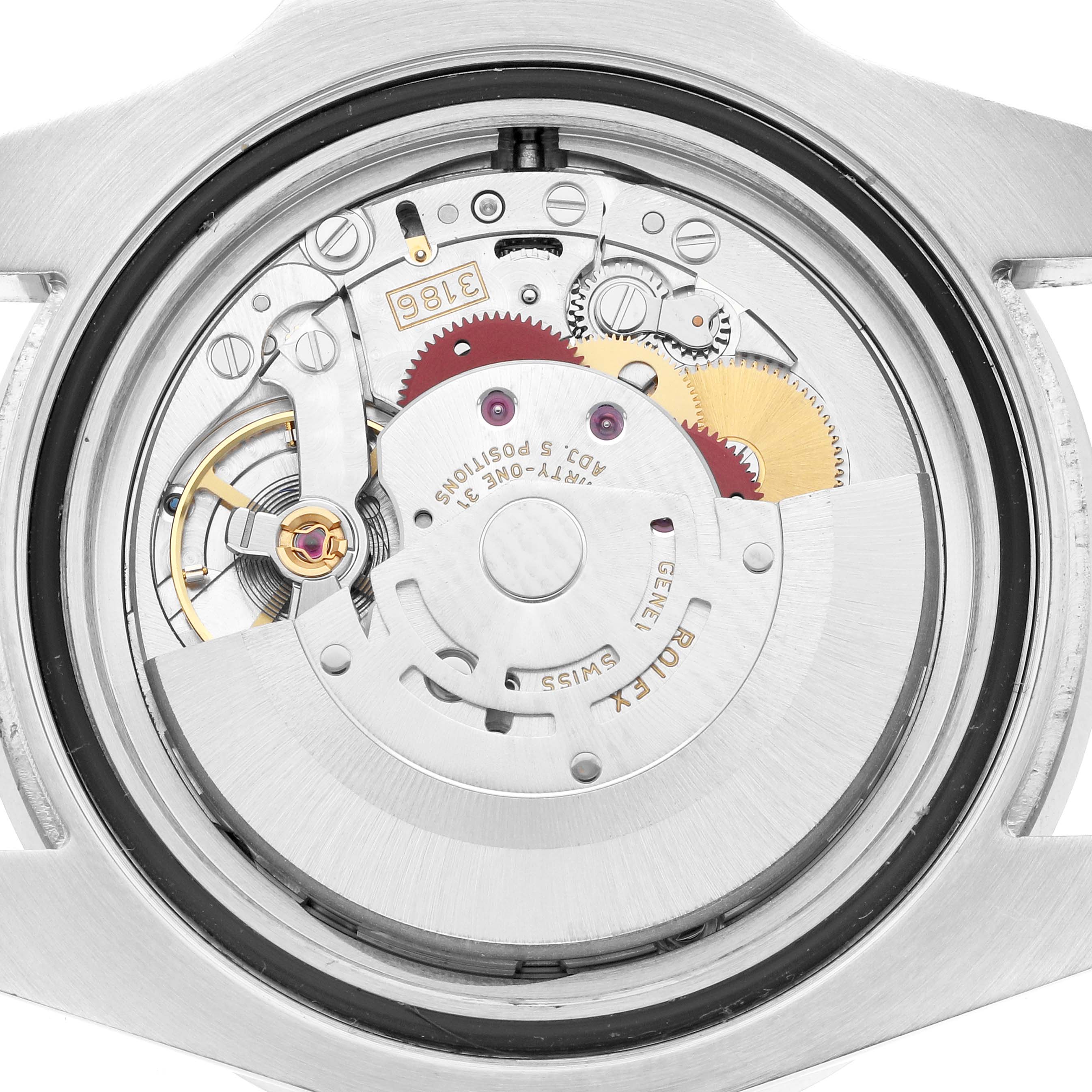 The image shows the movement mechanism of a Rolex GMT-Master 116710 Men
s Stainless Steel Black Dial watch from a back view, highlighting gears and inscriptions.