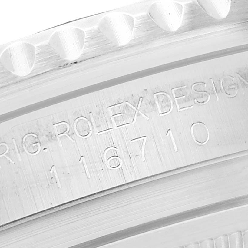 This close-up image shows the engraved model number and design details on the case side of a Rolex GMT-Master 116710 Men
s Stainless Steel Black Dial 116710 Men
s Stainless Steel Black Dial watch (model 16710).