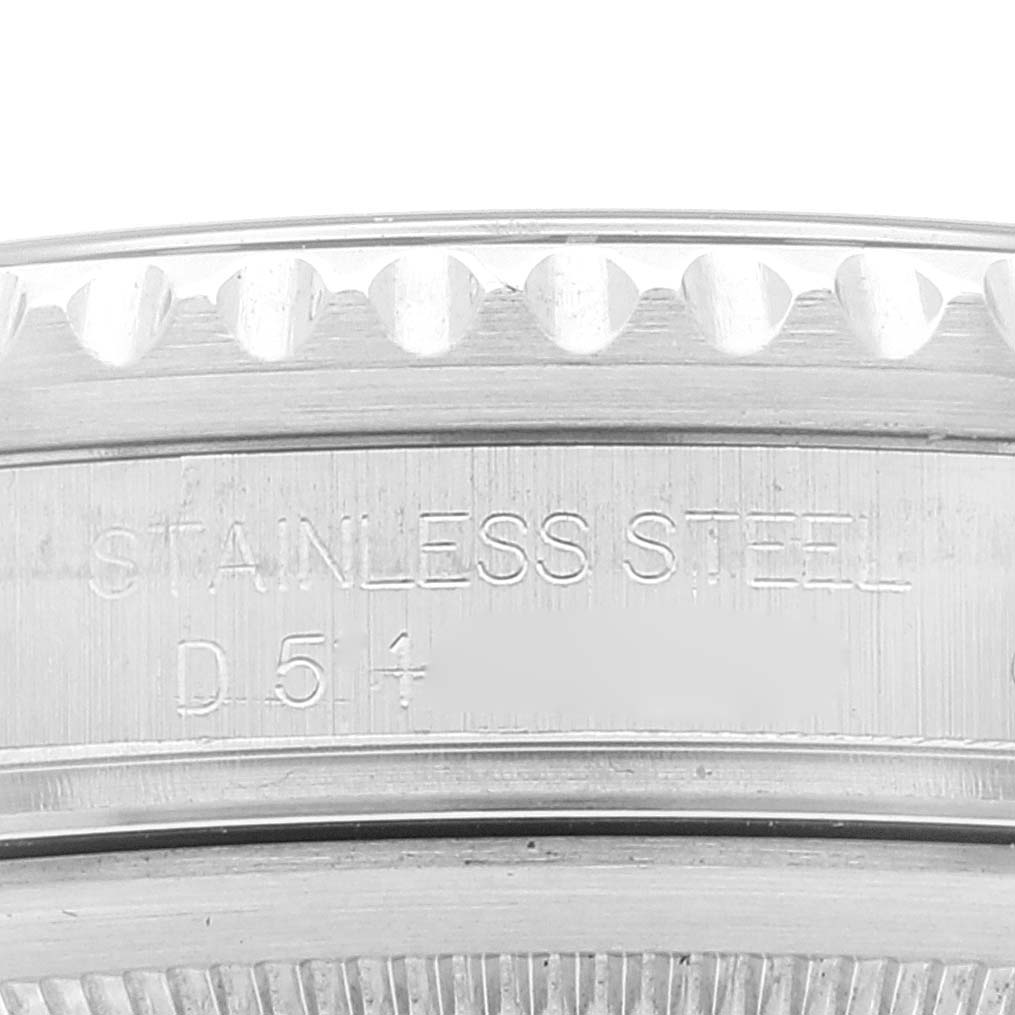 This image shows a close-up of the side engraving and serrated bezel of the stainless steel Rolex GMT-Master 16710 Men's Stainless Steel Black Dial 16710 Men's Stainless Steel Black Dial watch.