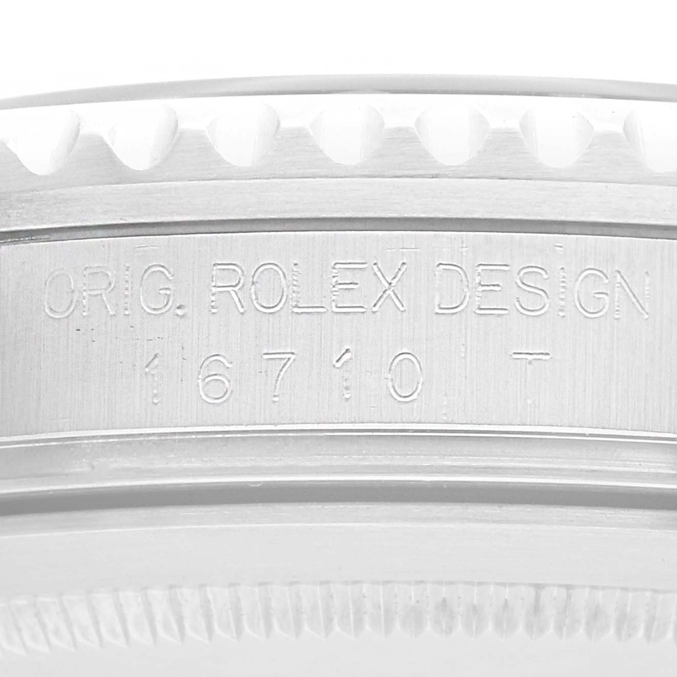 The image shows the side view of a Rolex GMT-Master 16710 Men
s Stainless Steel Black Dial model, highlighting the engraved case design and model number.