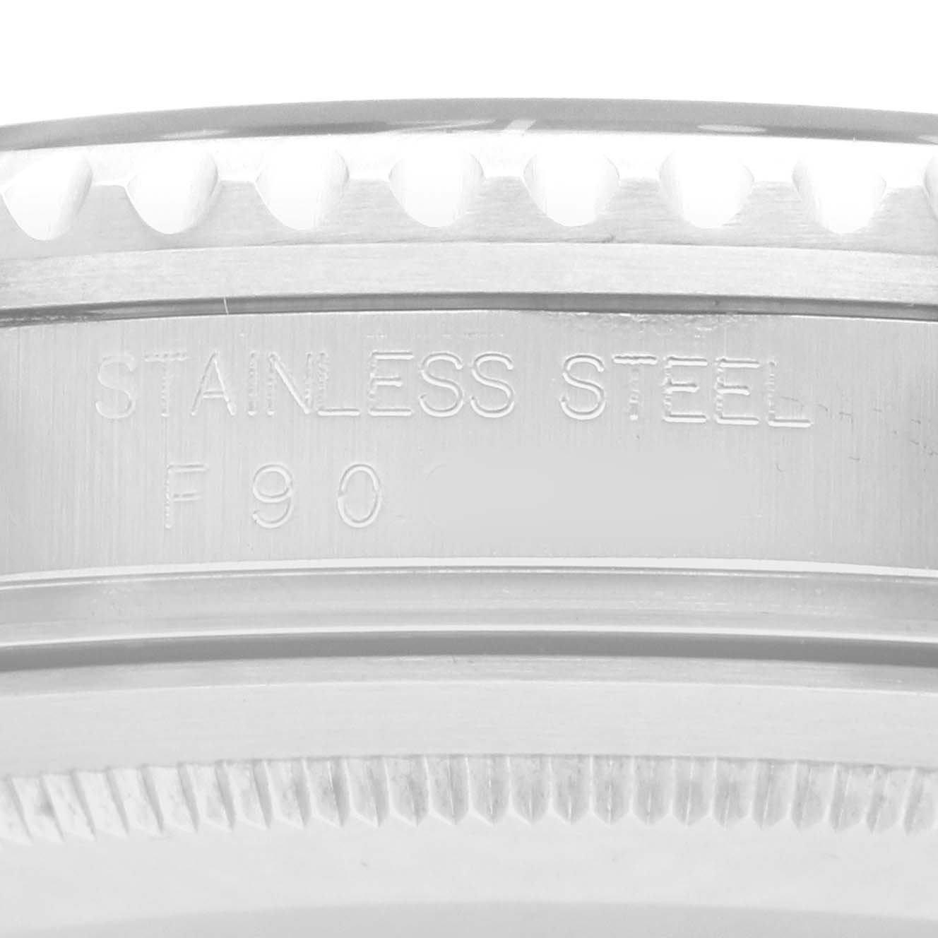 The image shows a close-up of the side of a Rolex GMT-Master 16710 Men
s Stainless Steel Black Dial case, highlighting the stainless steel material.