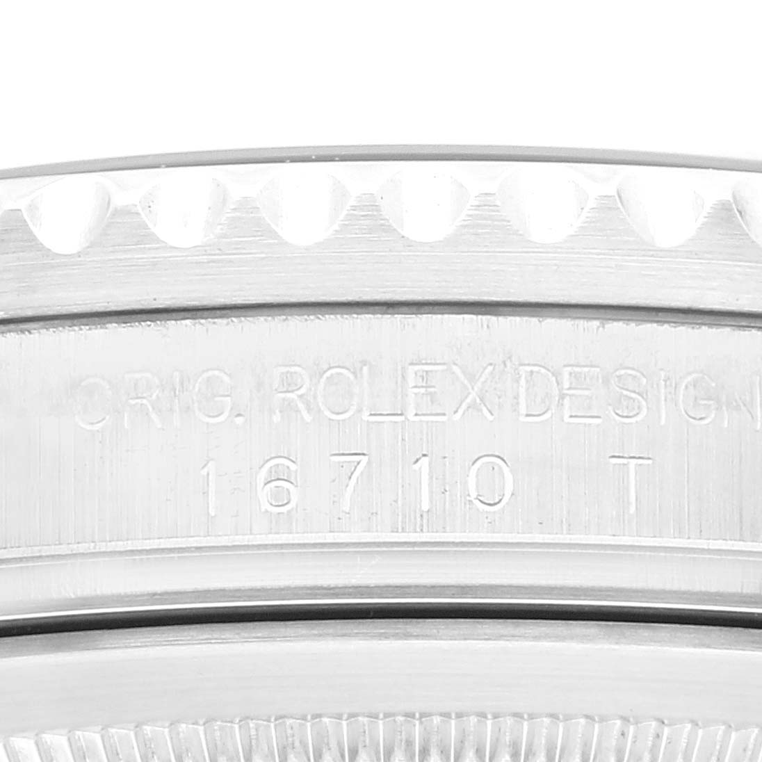 This is a close-up view of the side of the Rolex GMT-Master 16710 Men
s Stainless Steel Black Dial 16710 Men
s Stainless Steel Black Dial I case, showing the bezel and model number engraving.