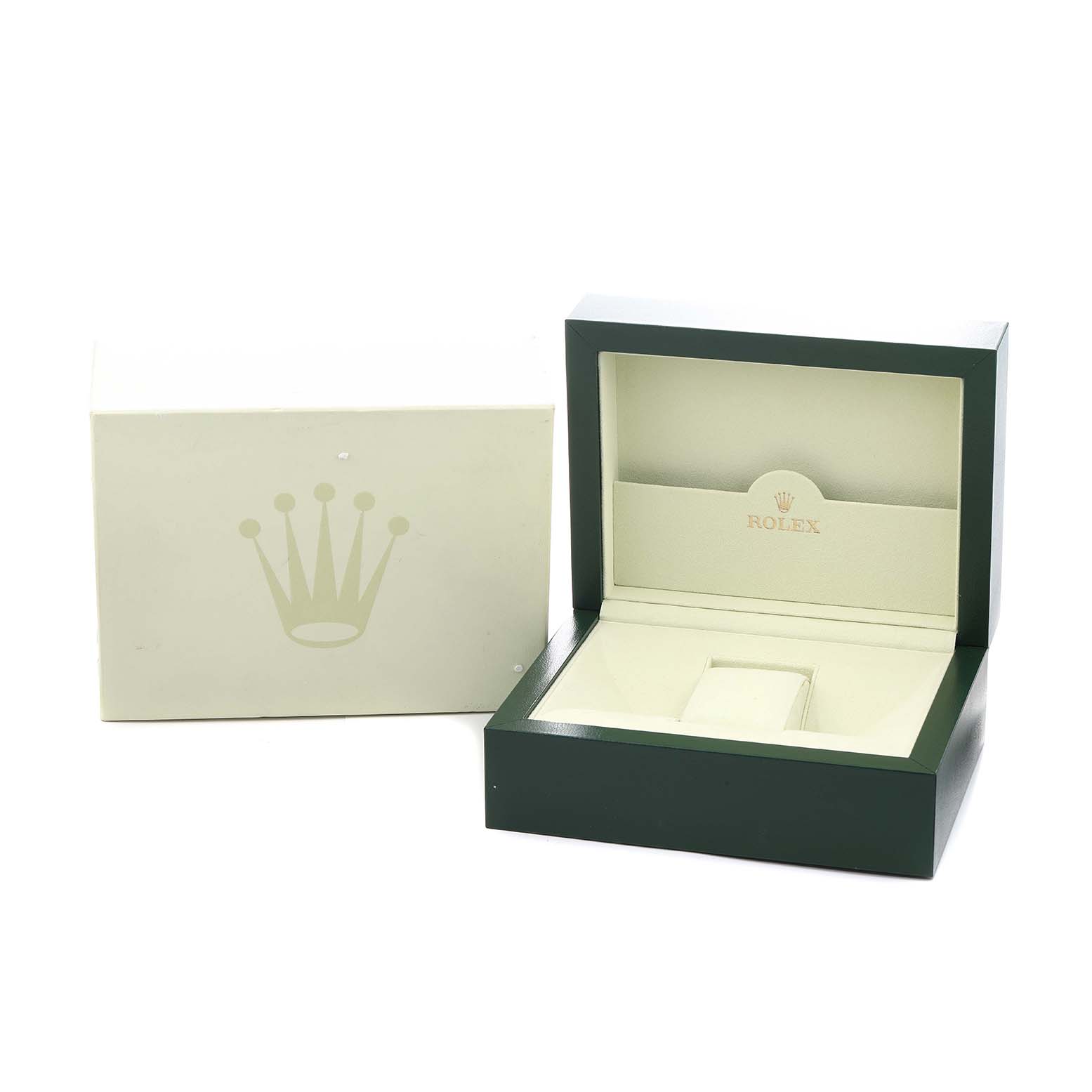 The image shows an open Rolex GMT-Master 116713 Men
s Steel and Gold (two tone) Black Dial box and packaging viewed from the front, without the watch inside.