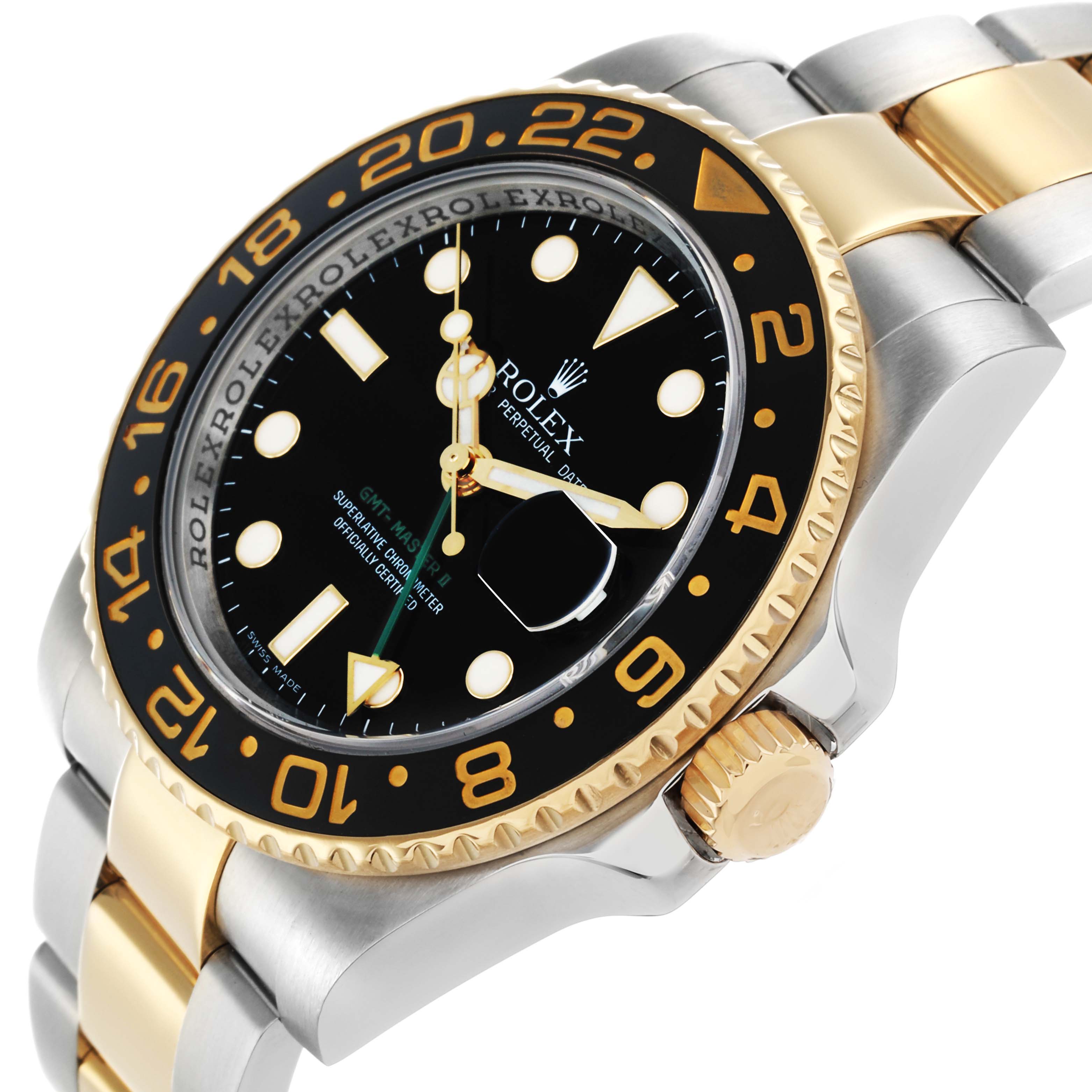 The Rolex GMT-Master 116713 Men
s Steel and Gold (two tone) Black Dial watch is shown at an angled side view, highlighting the bezel, dial, and part of the bracelet.
