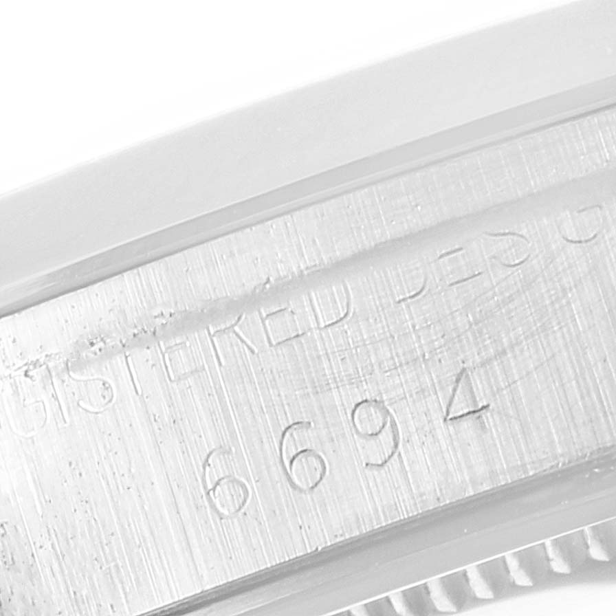 This is a close-up angle of the case side and model number 6694 on the Vintage Collection model by Rolex.