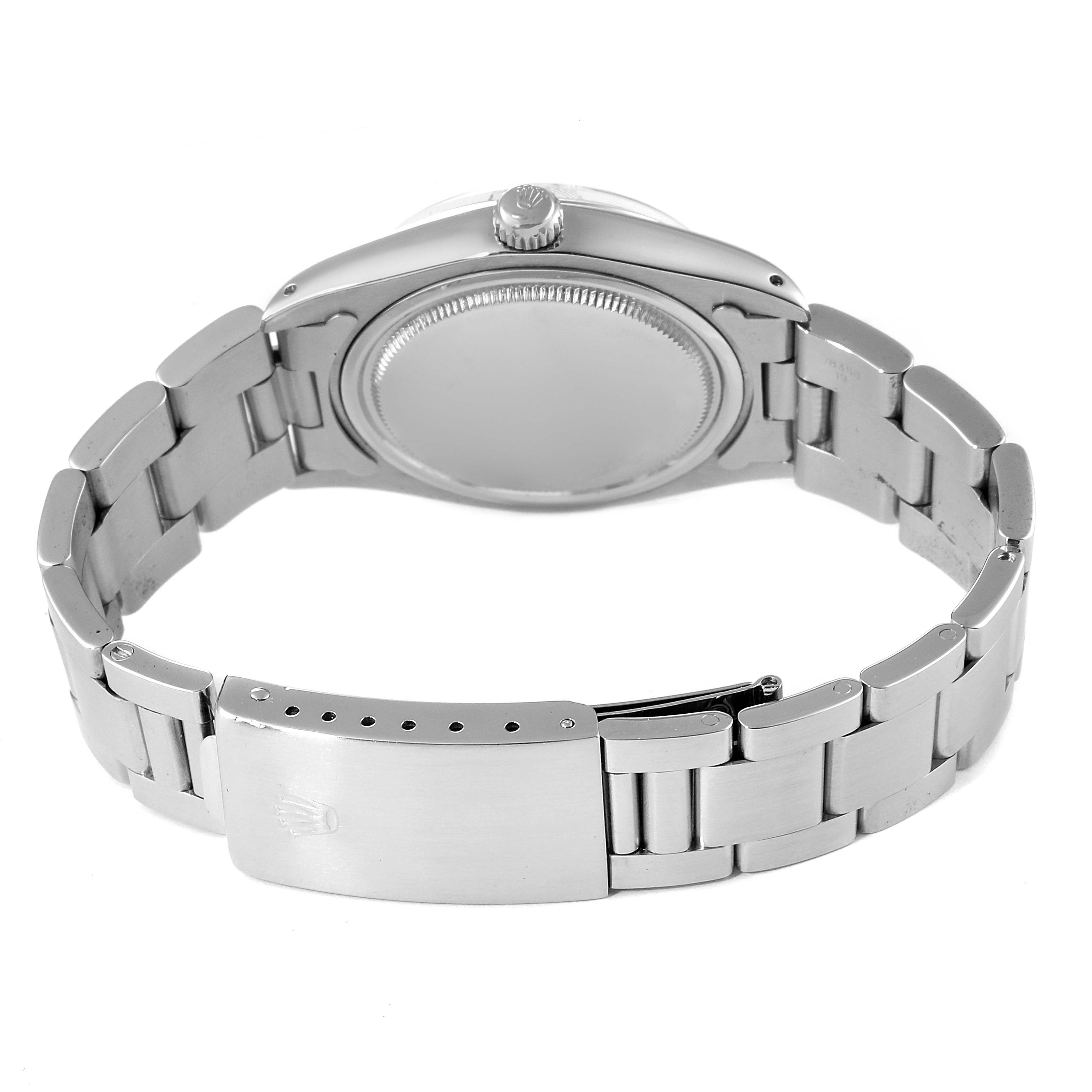 The image shows the back view of the Rolex Vintage Collection 6694 Men's Stainless Steel Silver Dial 6694 Men's Stainless Steel Silver Dial watch, highlighting the clasp, bracelet, and case back.