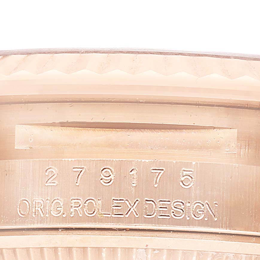 The image shows a close-up of the Rolex President 279175 Women's Rose Gold White Dial model's inner case engraving, featuring a serial number and "Orig. Rolex Design."