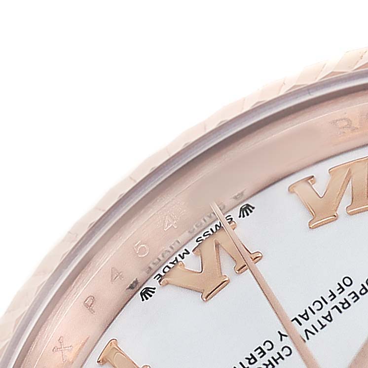 The image shows a close-up of the dial's edge, Roman numerals, and part of the bezel on a Rolex President 279175 Women's Rose Gold White Dial model watch.
