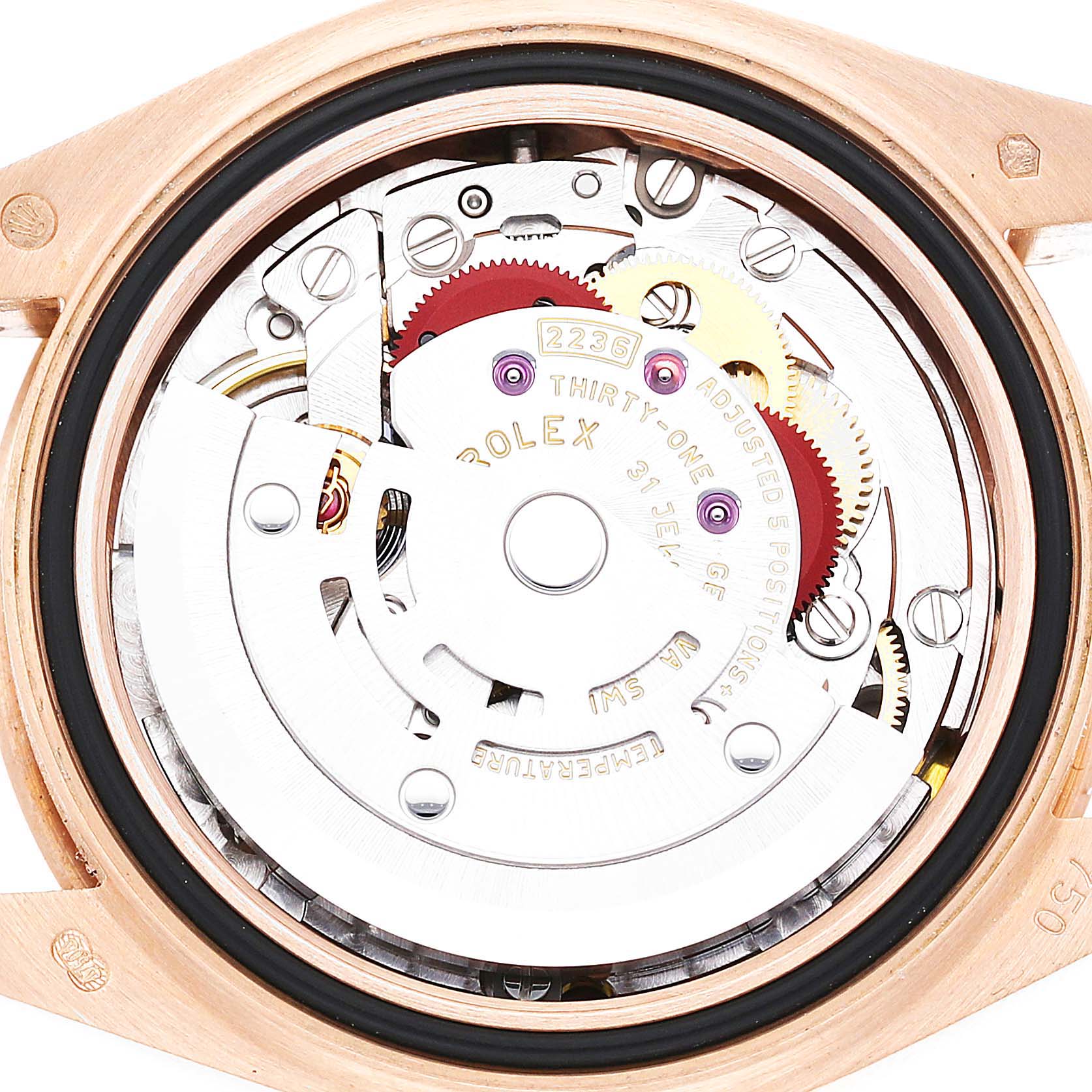 The image shows the intricate movement of the Rolex President 279175 Women's Rose Gold White Dial model, viewed from the back.