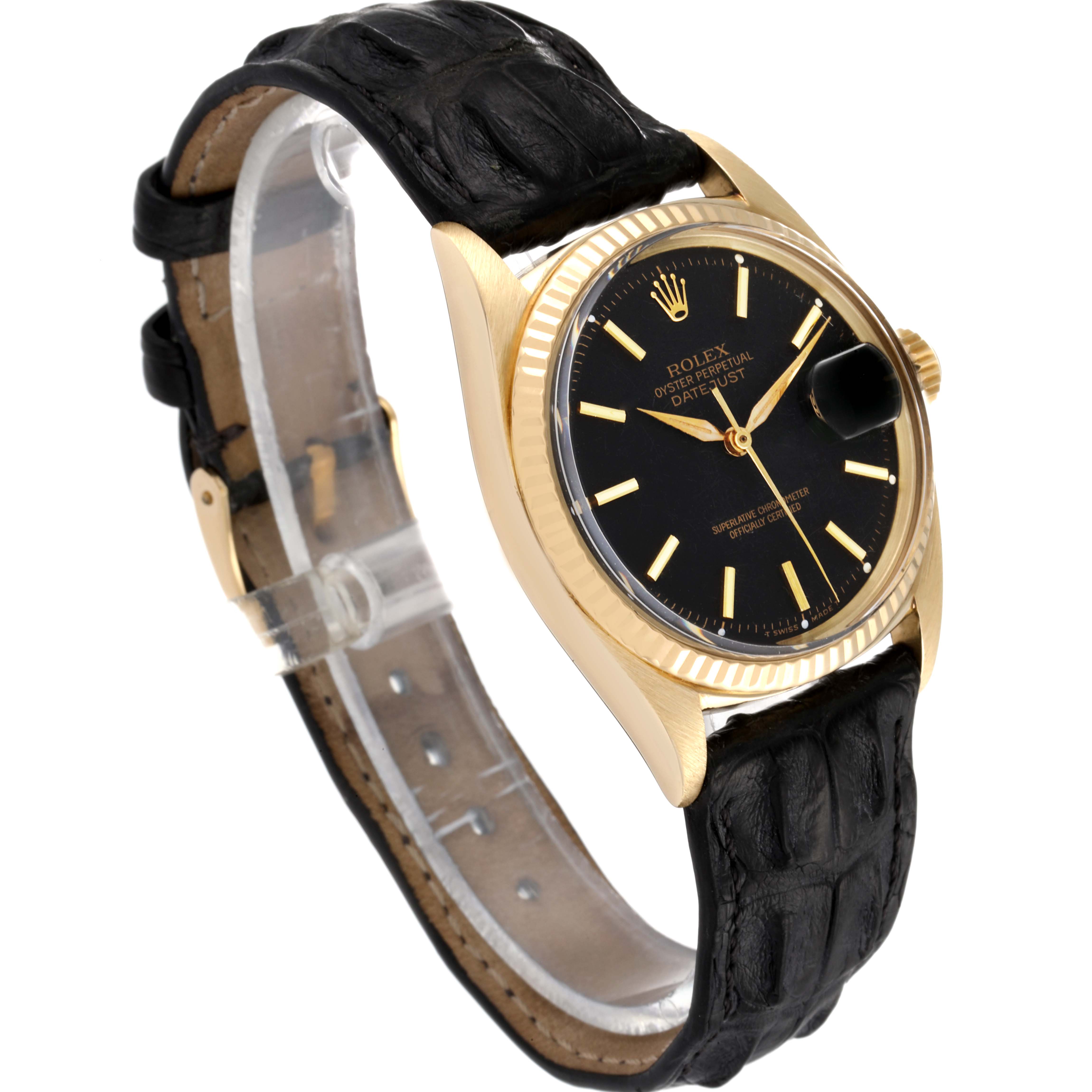 The image shows a side angle view of a Rolex Vintage Collection 1601 Men's Yellow Gold Black Dial 1601 Men's Yellow Gold Black Dial watch, highlighting the black strap, black dial, gold case, and crown.