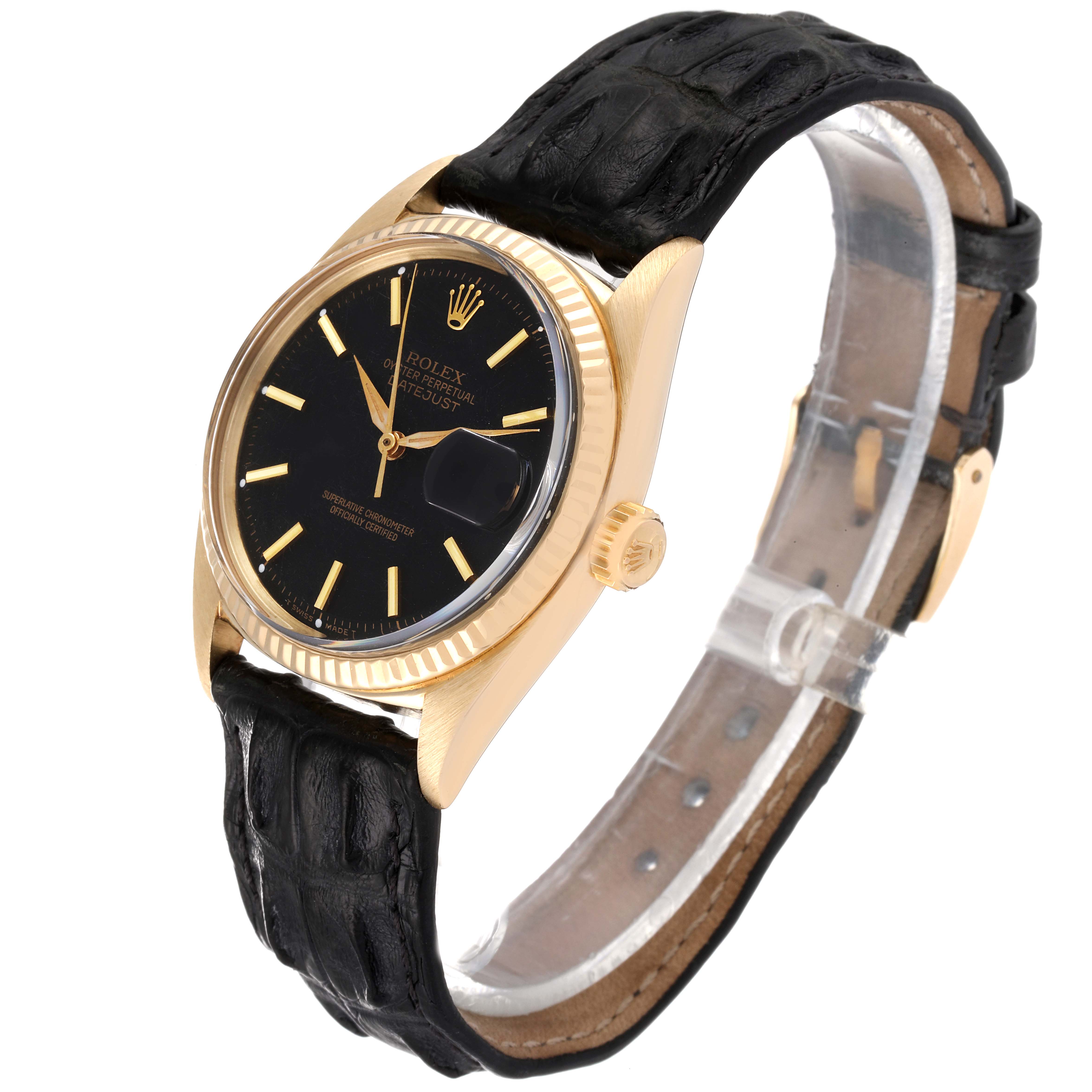 The Rolex Vintage Collection 1601 Men's Yellow Gold Black Dial 1601 Men's Yellow Gold Black Dial watch is shown from an angled side view, highlighting the black dial, gold casing, and black leather strap.