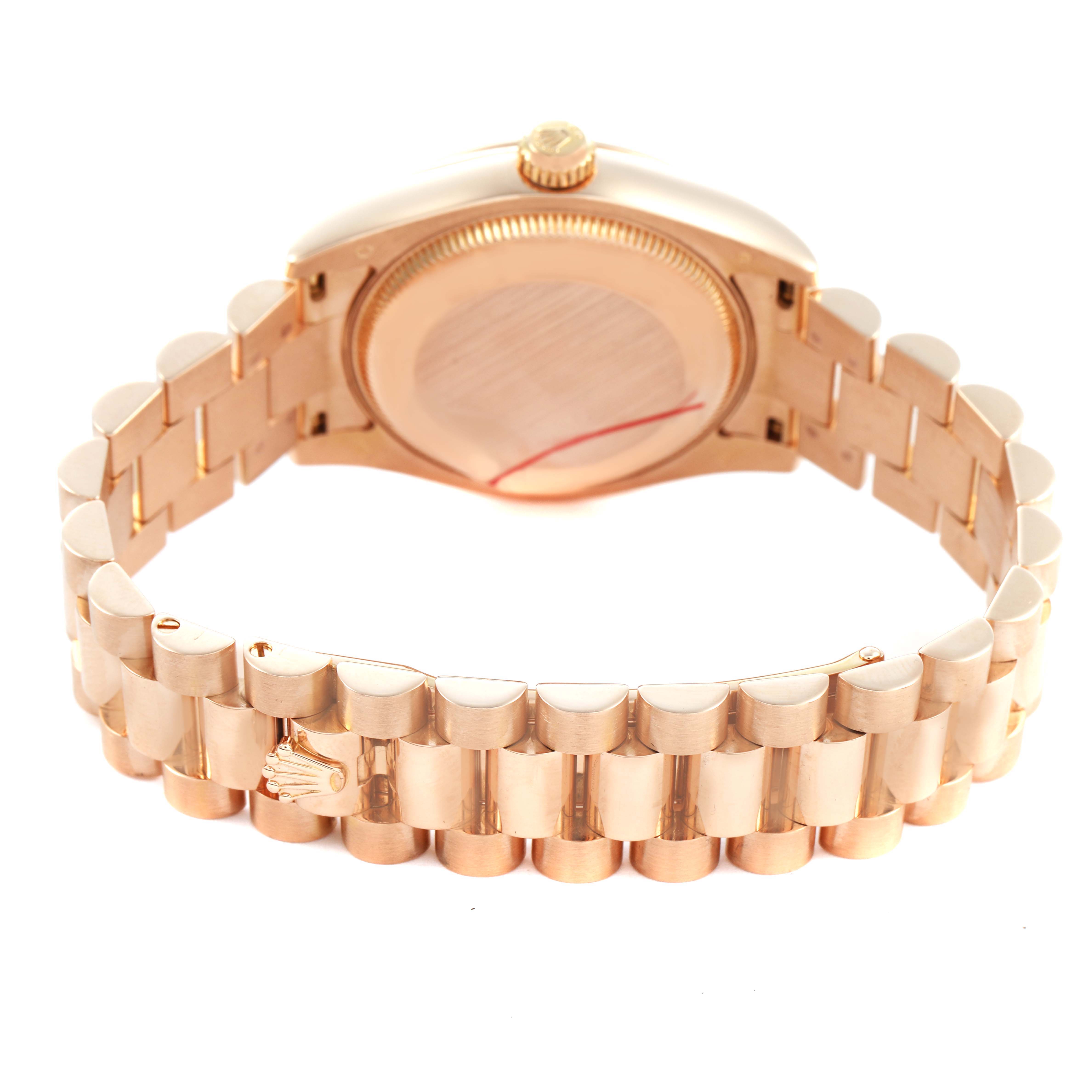 The Rolex President 178275 Women's Rose Gold Pink Dial model is shown from the back, highlighting the gold bracelet and case back.