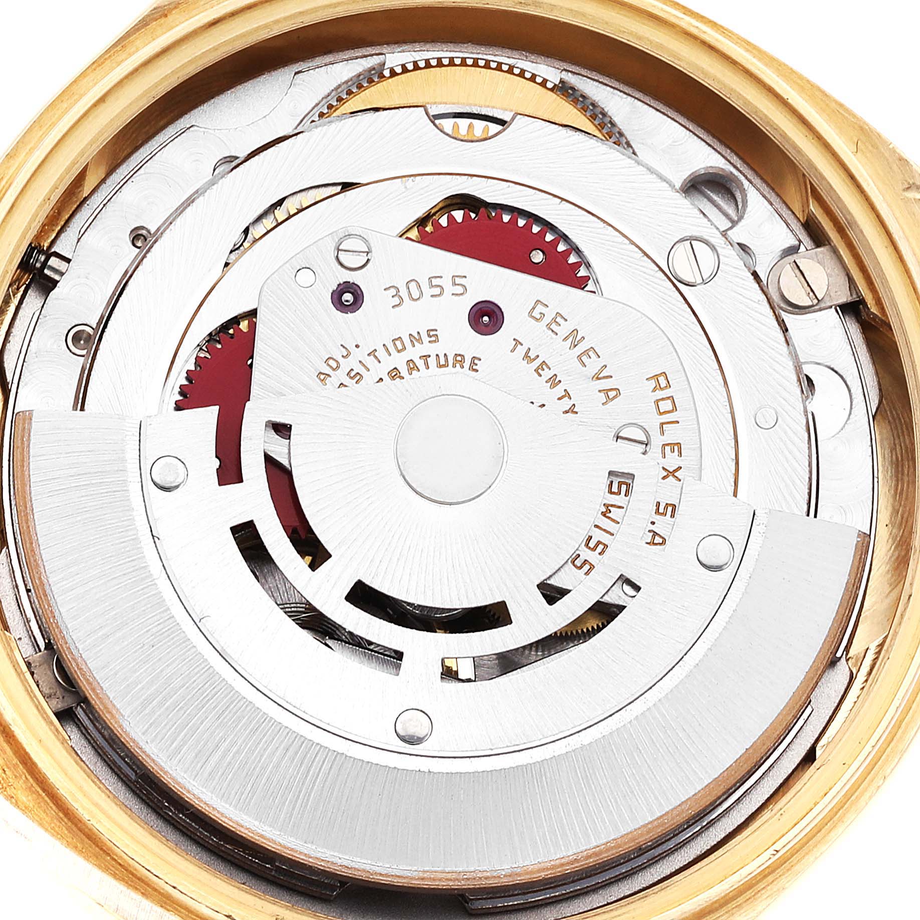 The image shows a close-up of the Rolex President 18138 Men
s Yellow Gold Champagne Dial 18138 Men
s Yellow Gold Champagne Dial model
s internal mechanism, highlighting its intricate movement components.
