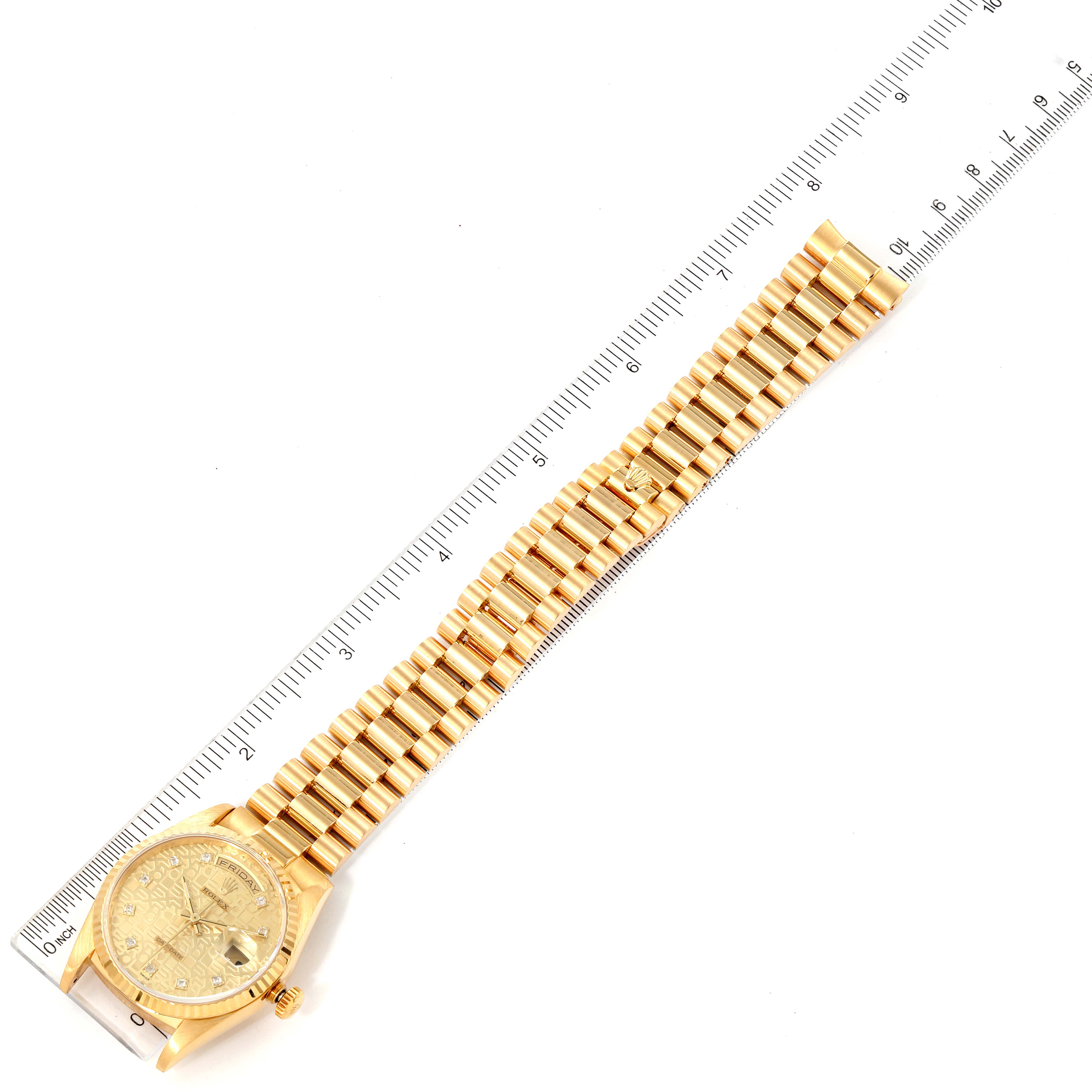The image shows a top view of a Rolex President 18238 Men
s Yellow Gold Champagne Dial 18238 Men
s Yellow Gold Champagne Dial model watch alongside a ruler for scale.